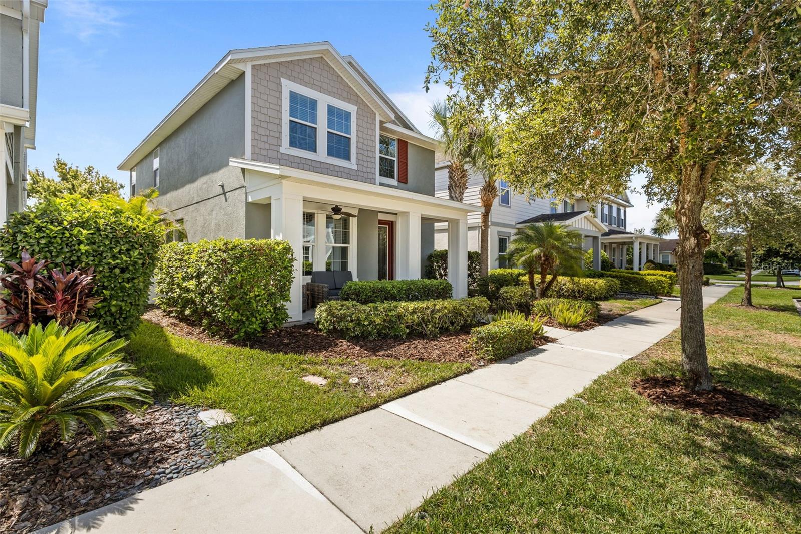 Beautiful Asturia home with an inviting covered front porch and rear-entry 2-car garage