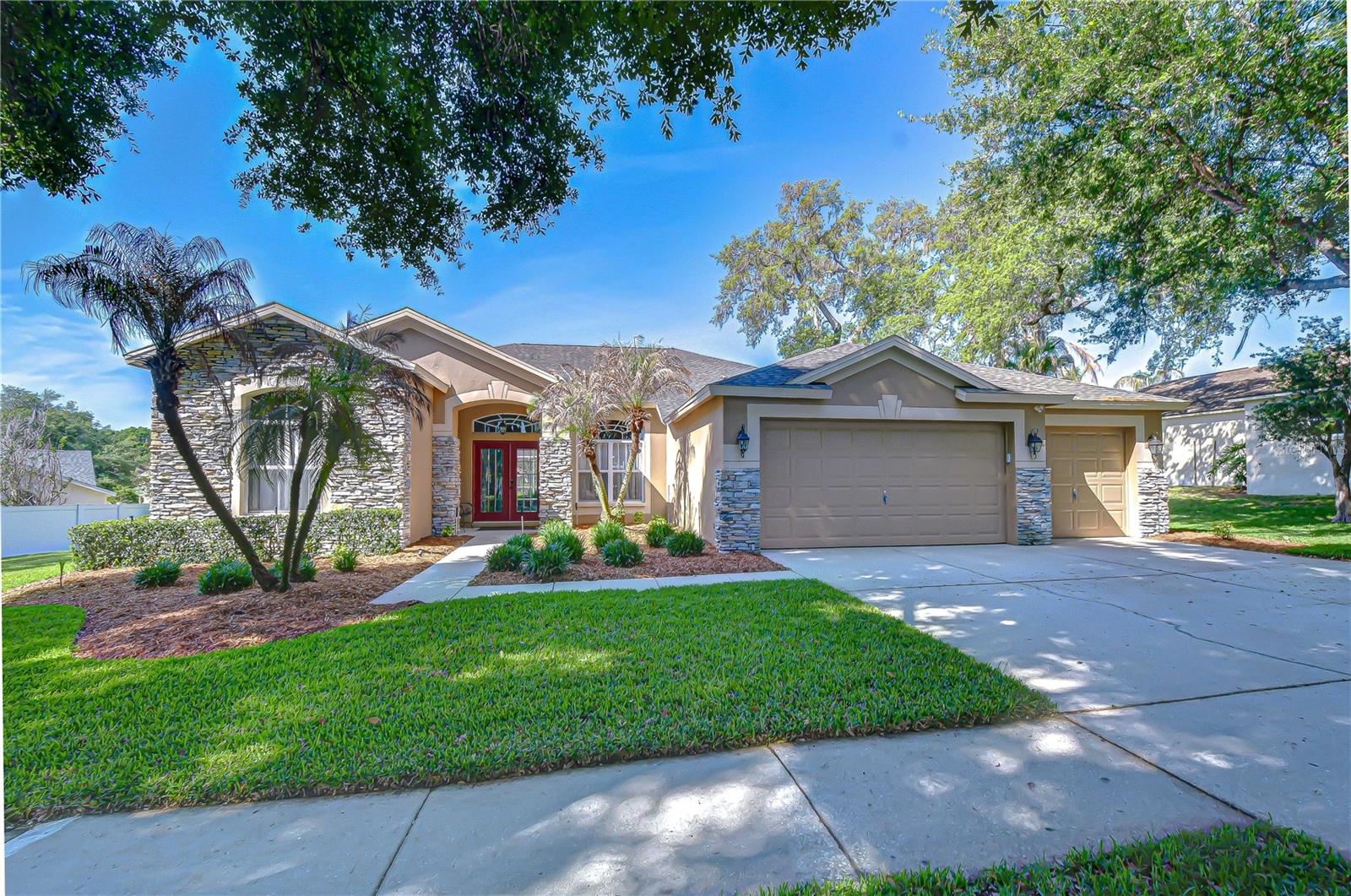 Beautifully maintained residence on an oversized homesite in Bloomingdale.
