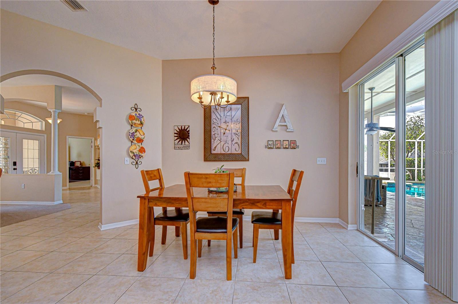 Casual dining area overlooking family room.