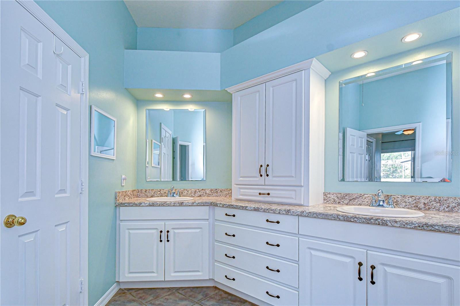 Updated sinks, countertops, and cabinetry.