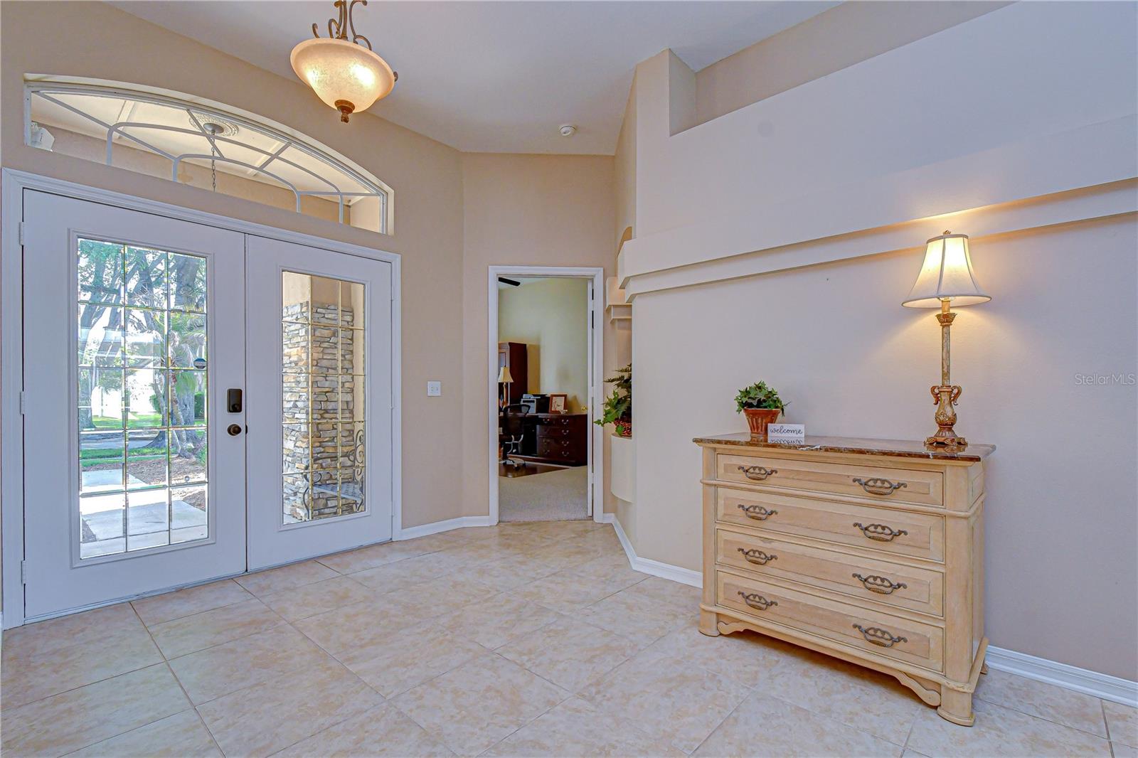 Welcoming entry opening into bright and spacious living areas.