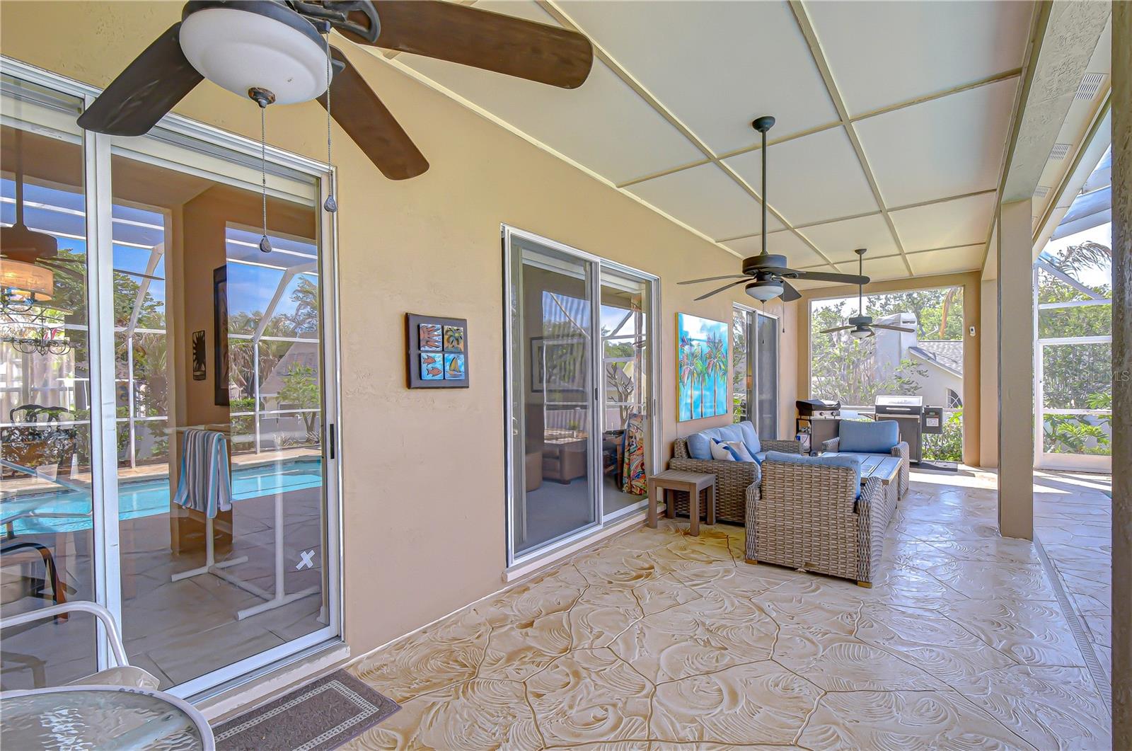 Expansive screened outdoor living area.