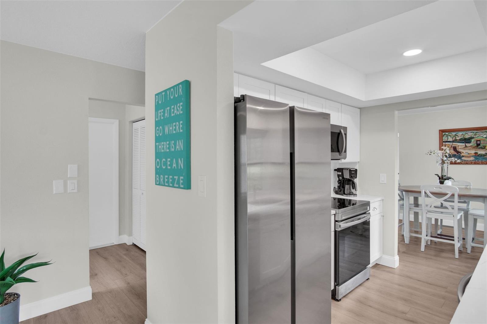Hall leading to the indoor laundry room & garage access~
