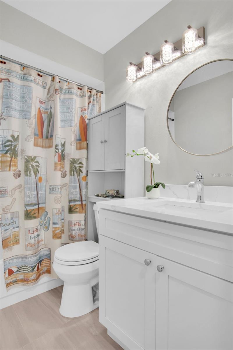 Newer vanity, lighting, and flooring~