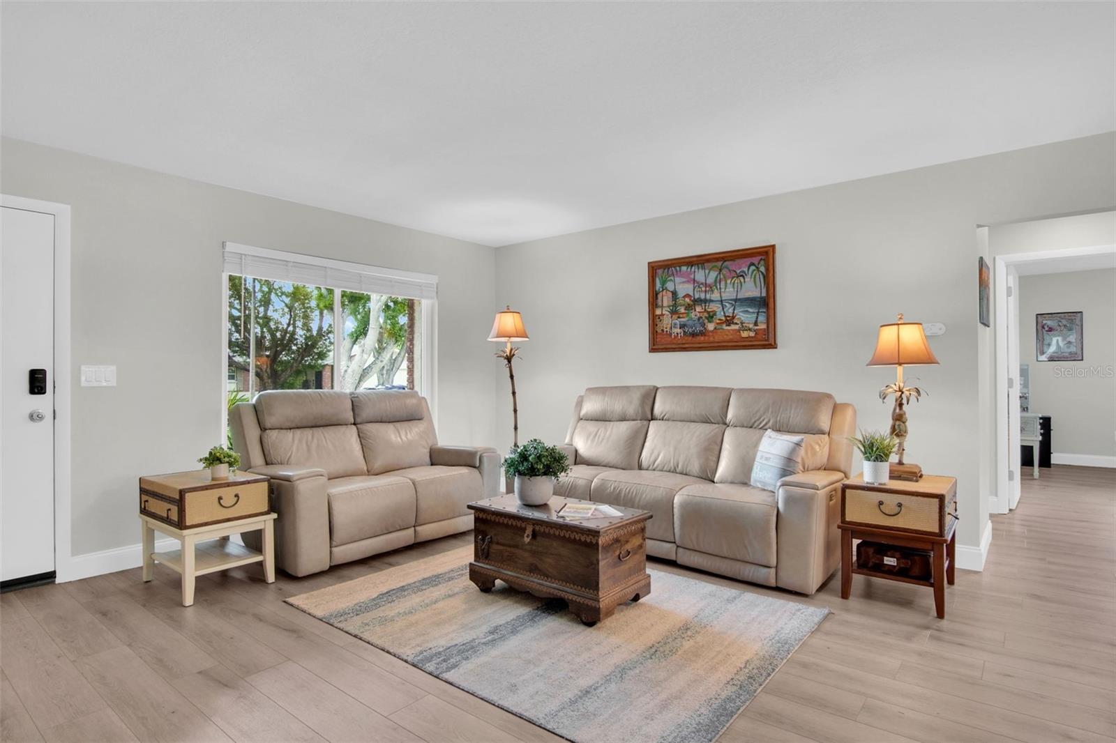 Beautiful luxury vinyl plank flooring, and ZERO popcorn ceiling~