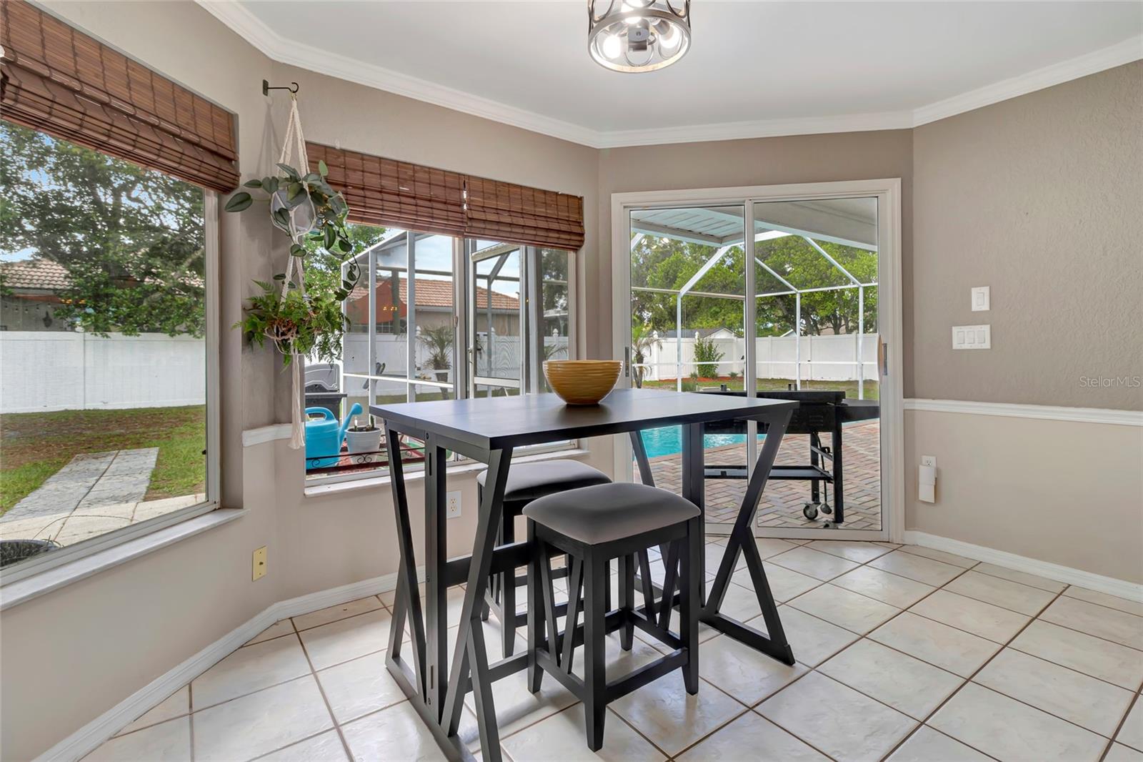 Breakfast Nook with Bay Window and Sliding Glass Doors to Lanai