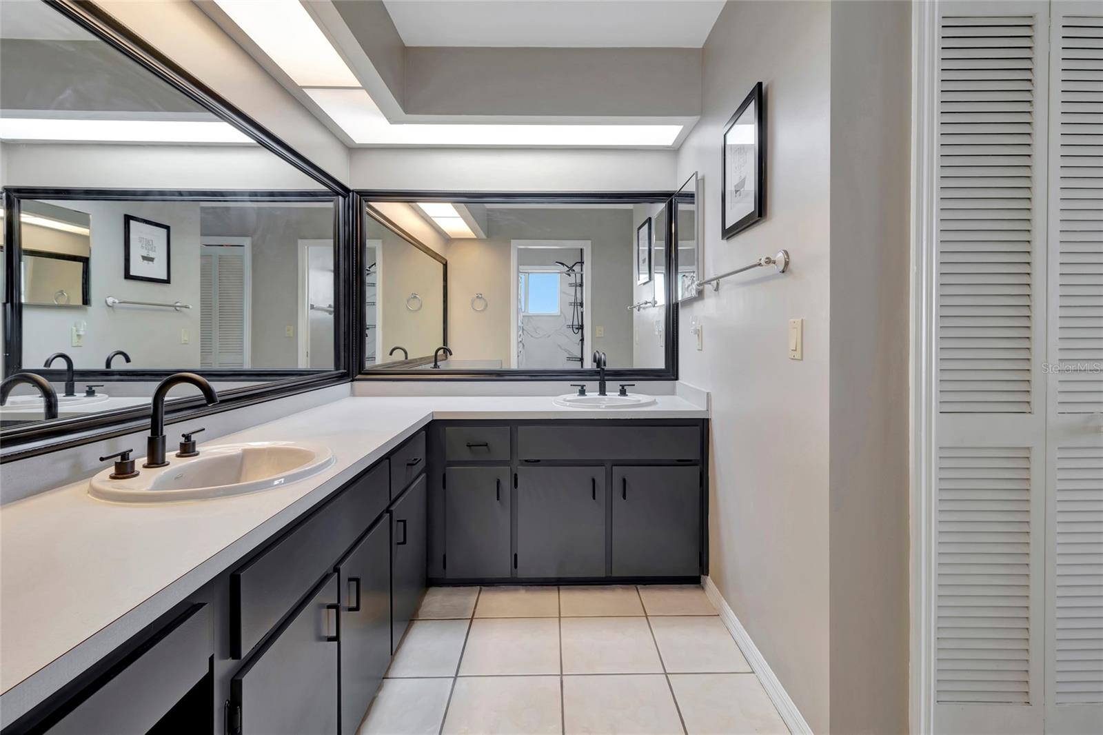 Primary Bathroom with Dual Sinks and New Fixtures