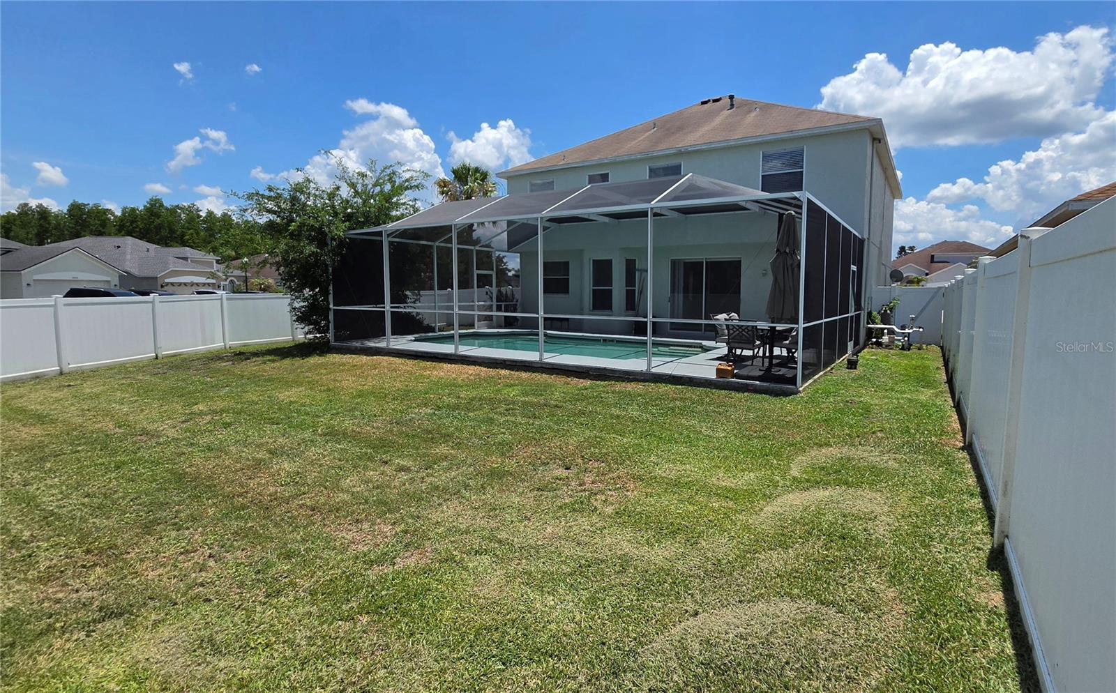 screened pool and large back yard