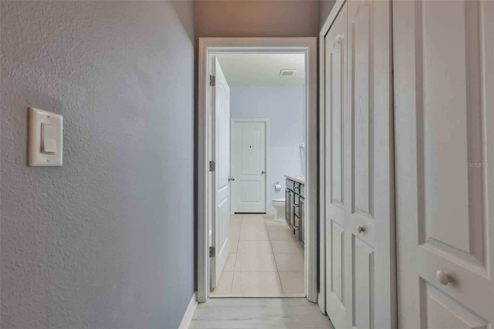 Primary bedroom - built in closet on right