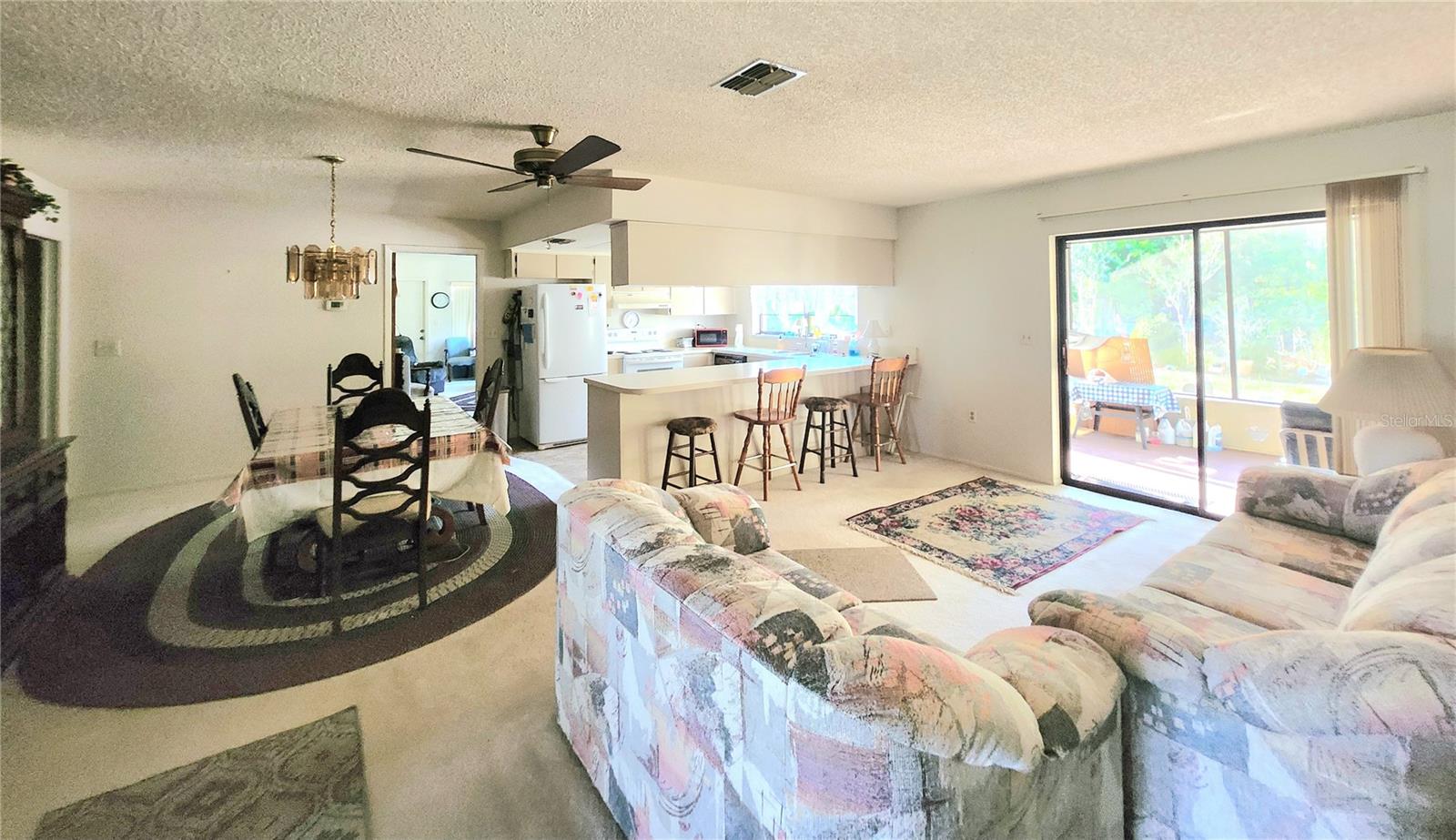 Dining, living room and kitchen view