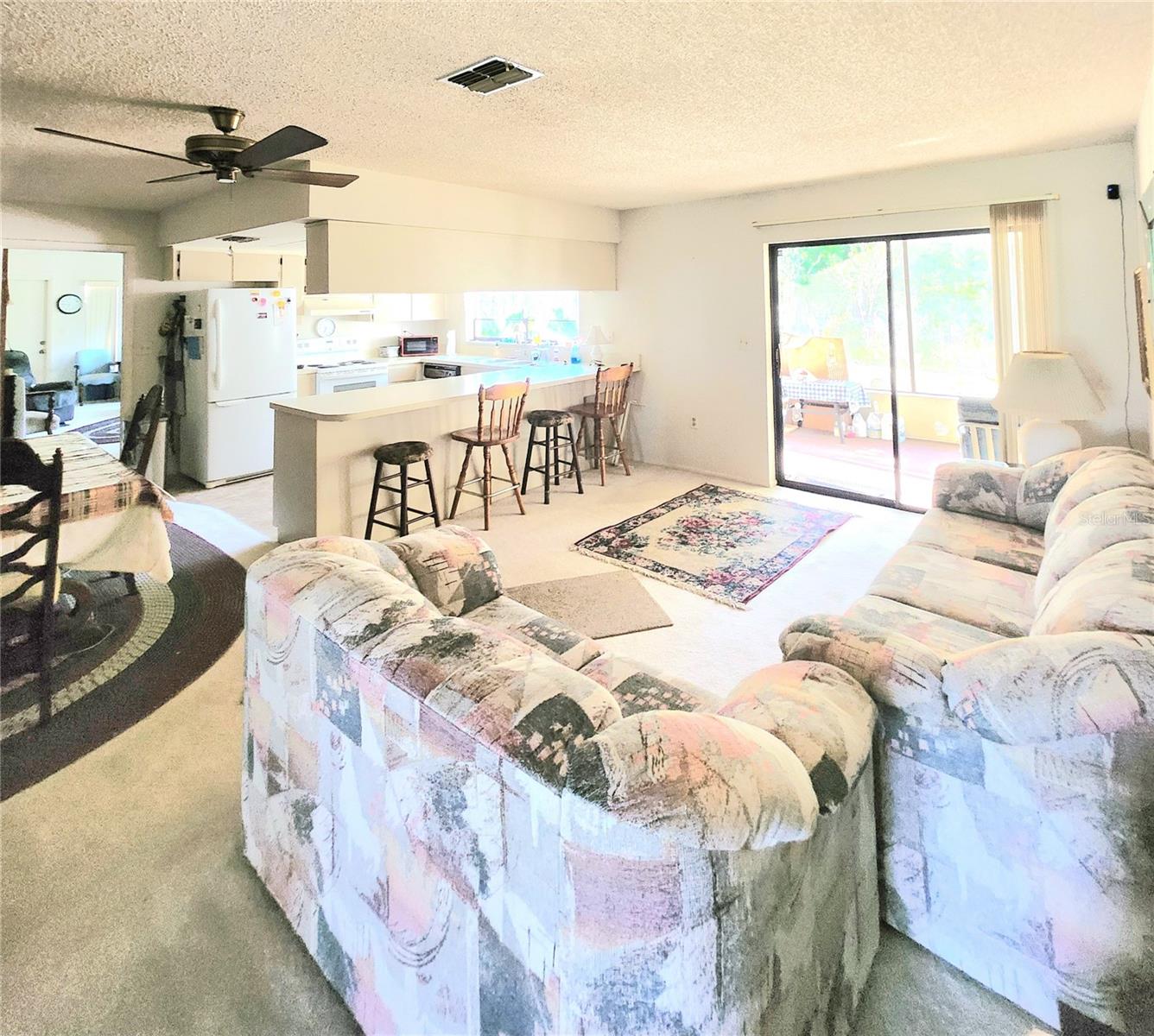 Living room, kitchen view