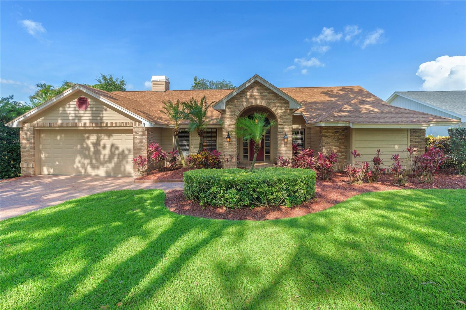 Front of home with beautiful landscaped from yard