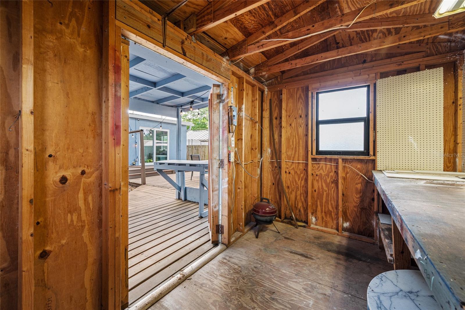 detached workshop with built in desk, perfect for projects and hobbies