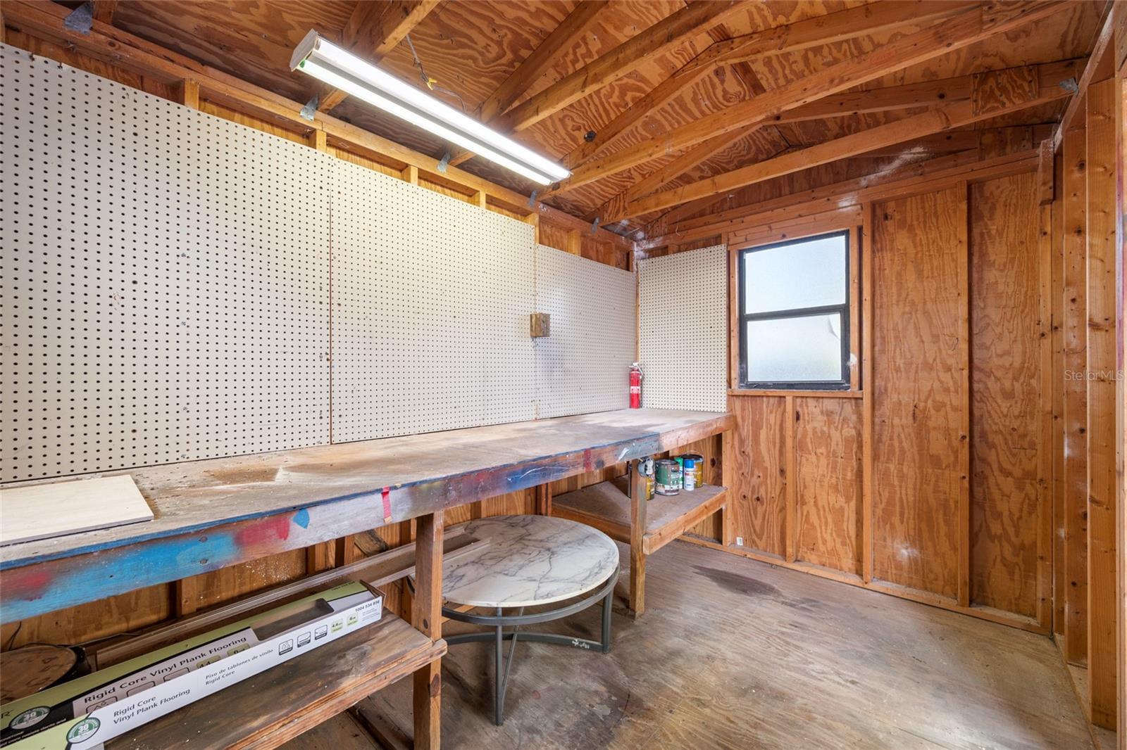 Detached workshop with built in desk, perfect for projects and hobbies