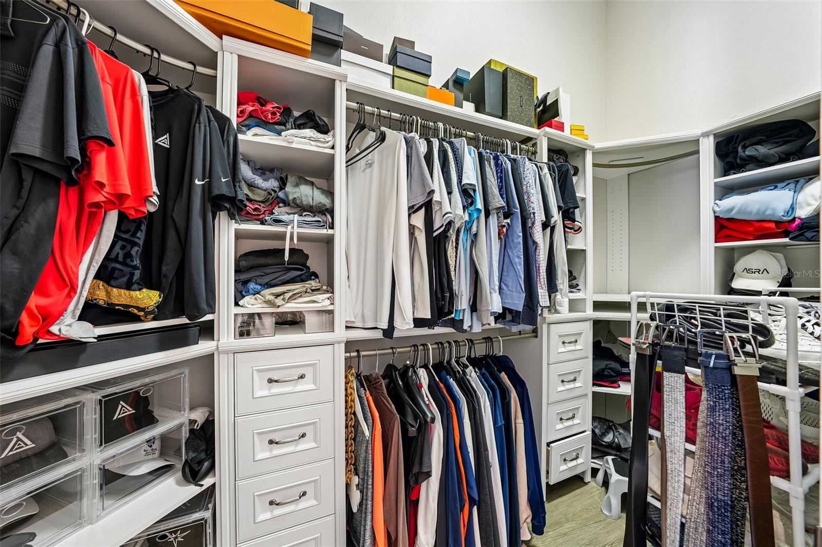 Primary bedroom walk-in closet