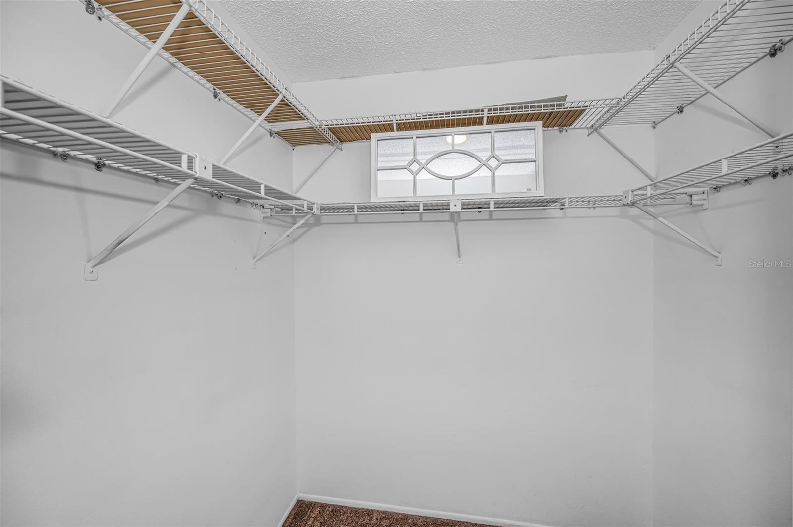 Primary Suite Walk in Closet