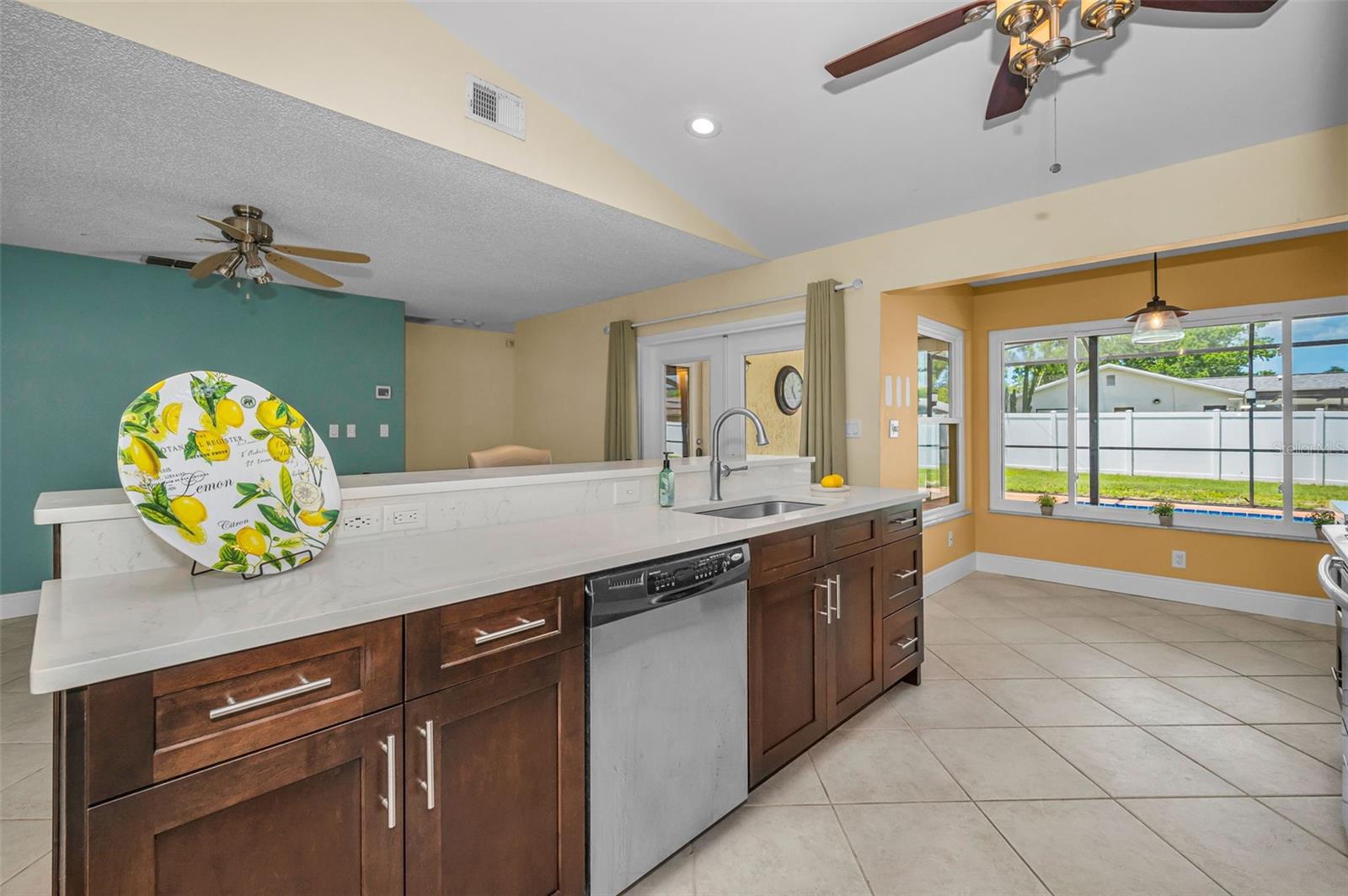 Updated open kitchen with quartz countertops