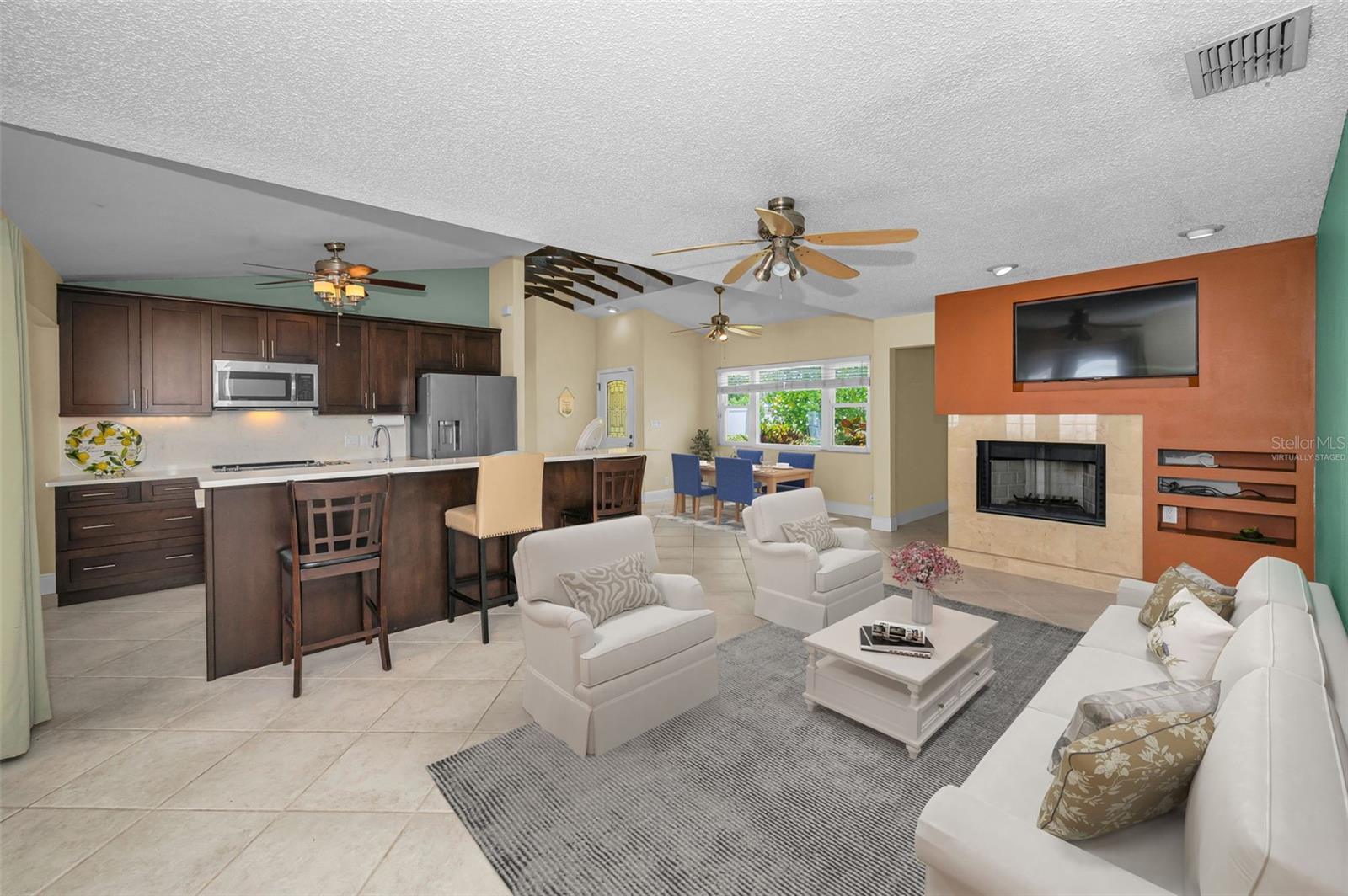 Family Room with fireplace virtually staged