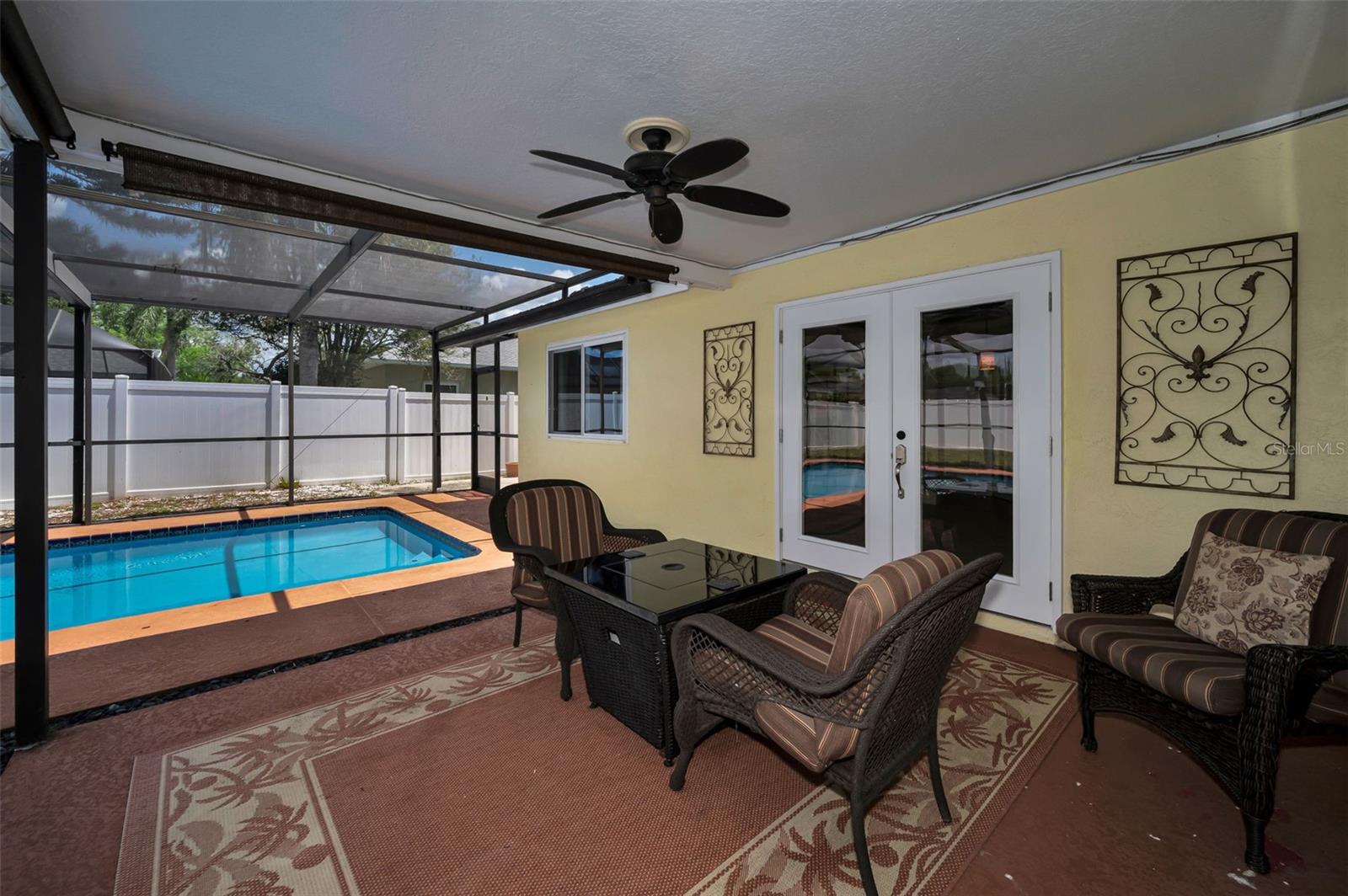 Lanai with fire table gathering space