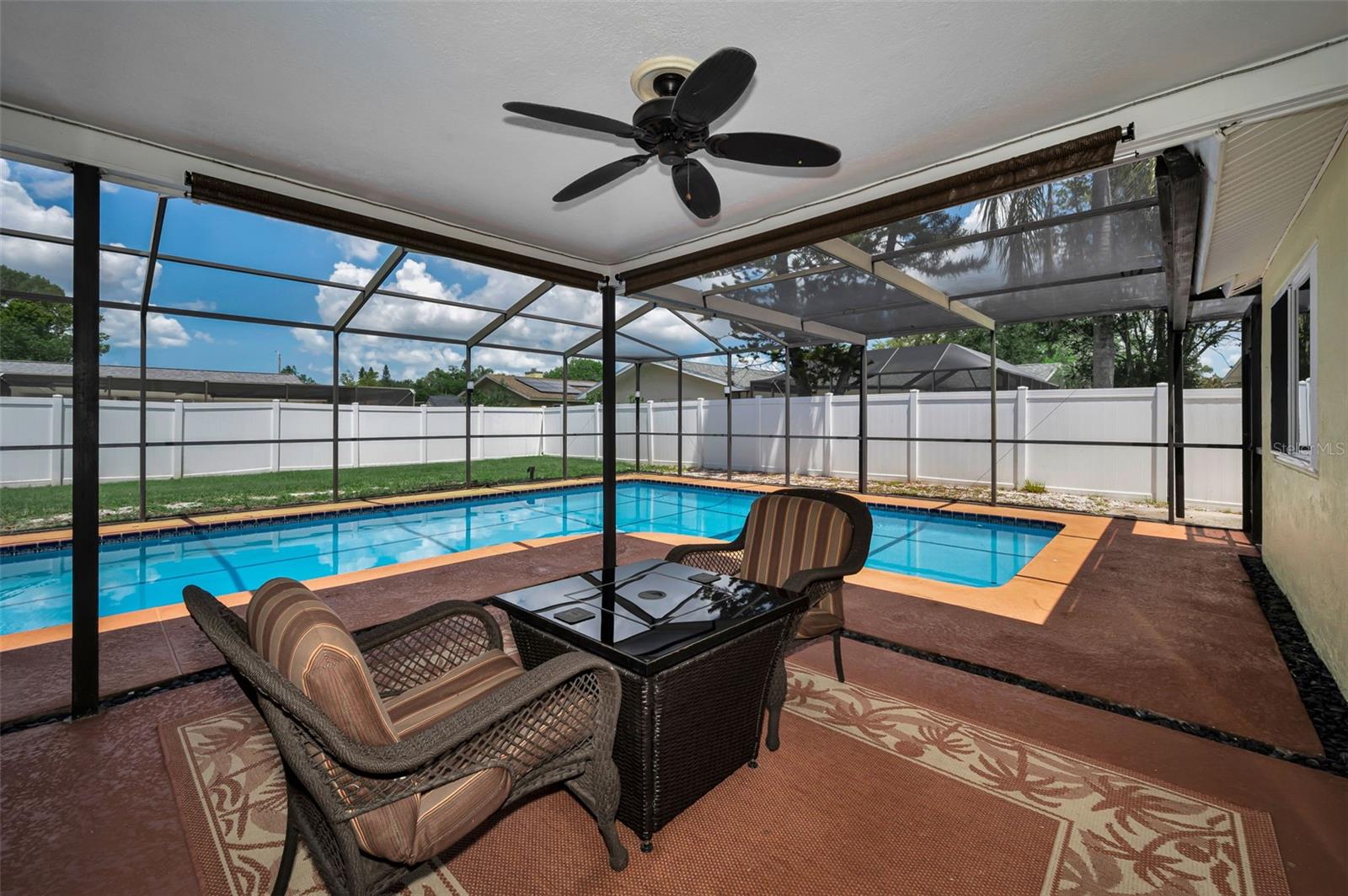 Lanai with fire table gathering space