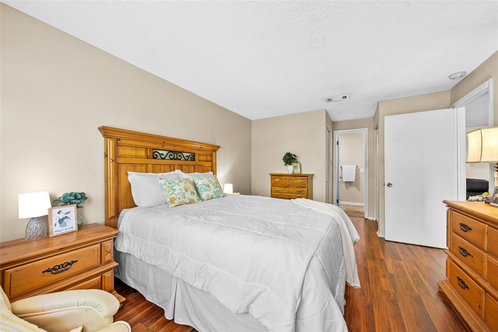 Warm and Welcoming Primary Bedroom