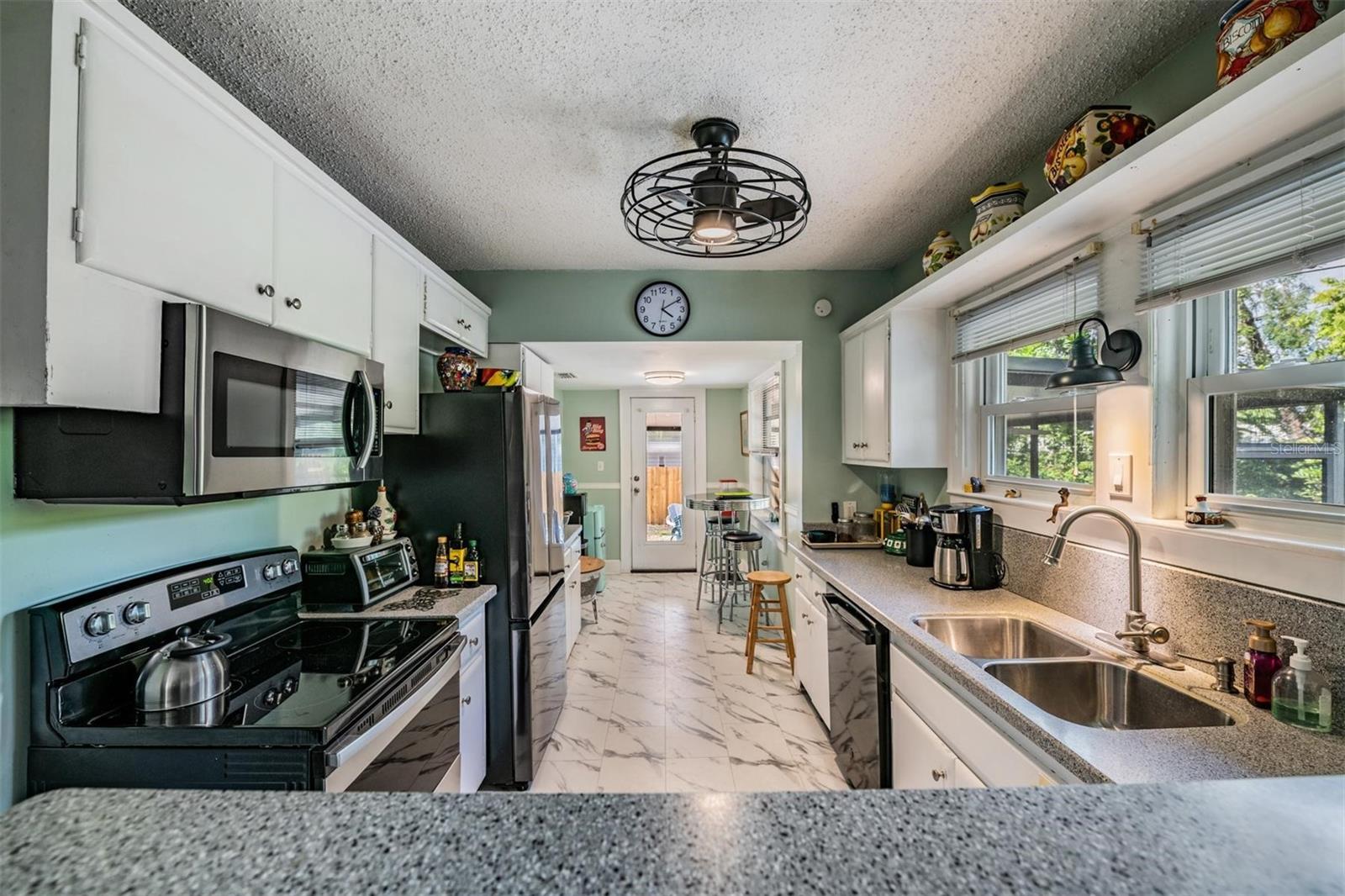 Kitchen looking toward back porch