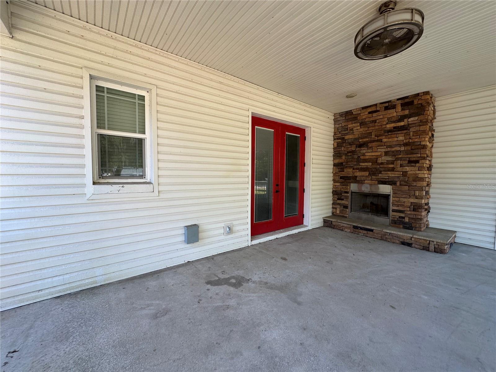 Outdoor Fireplace Outside Primary Bedroom