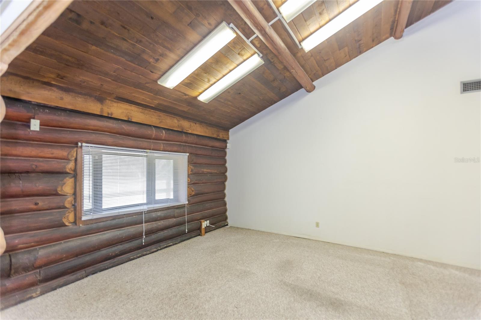 Family Room with Wood Beamed Ceiling