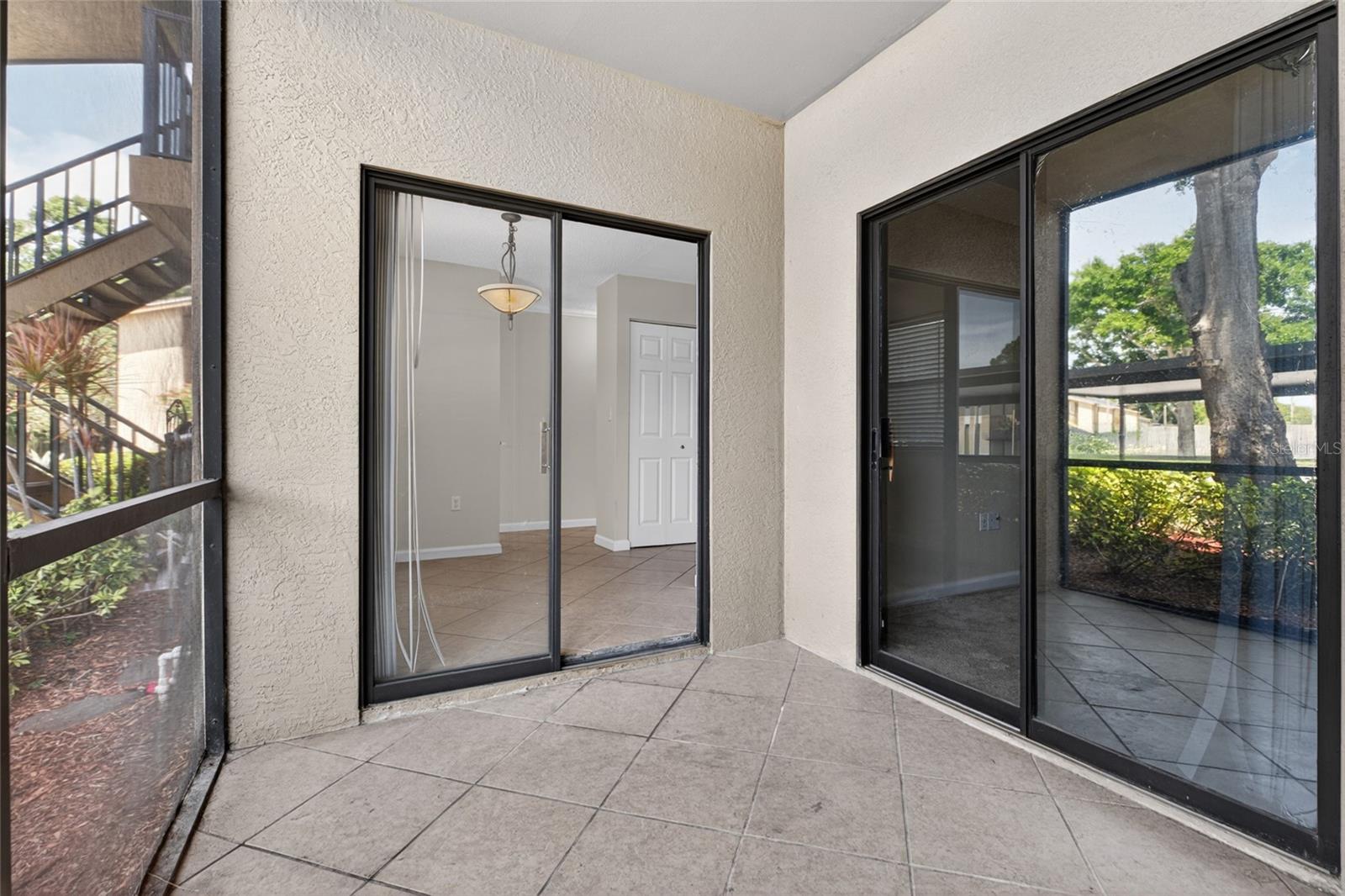 The front lanai has sliders that lead to the dining room and the front bedroom.