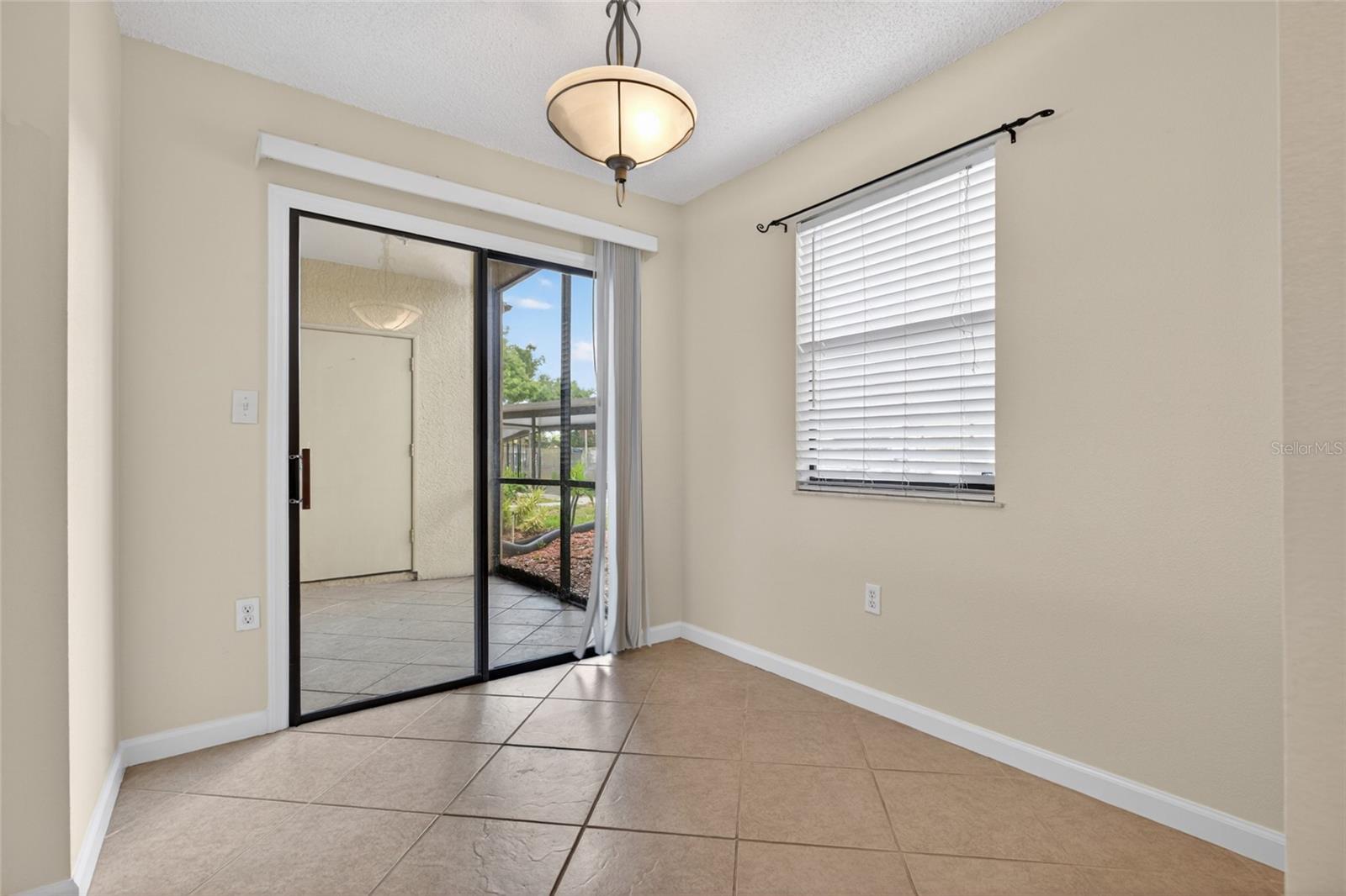 The dining room, off of the kitchen.