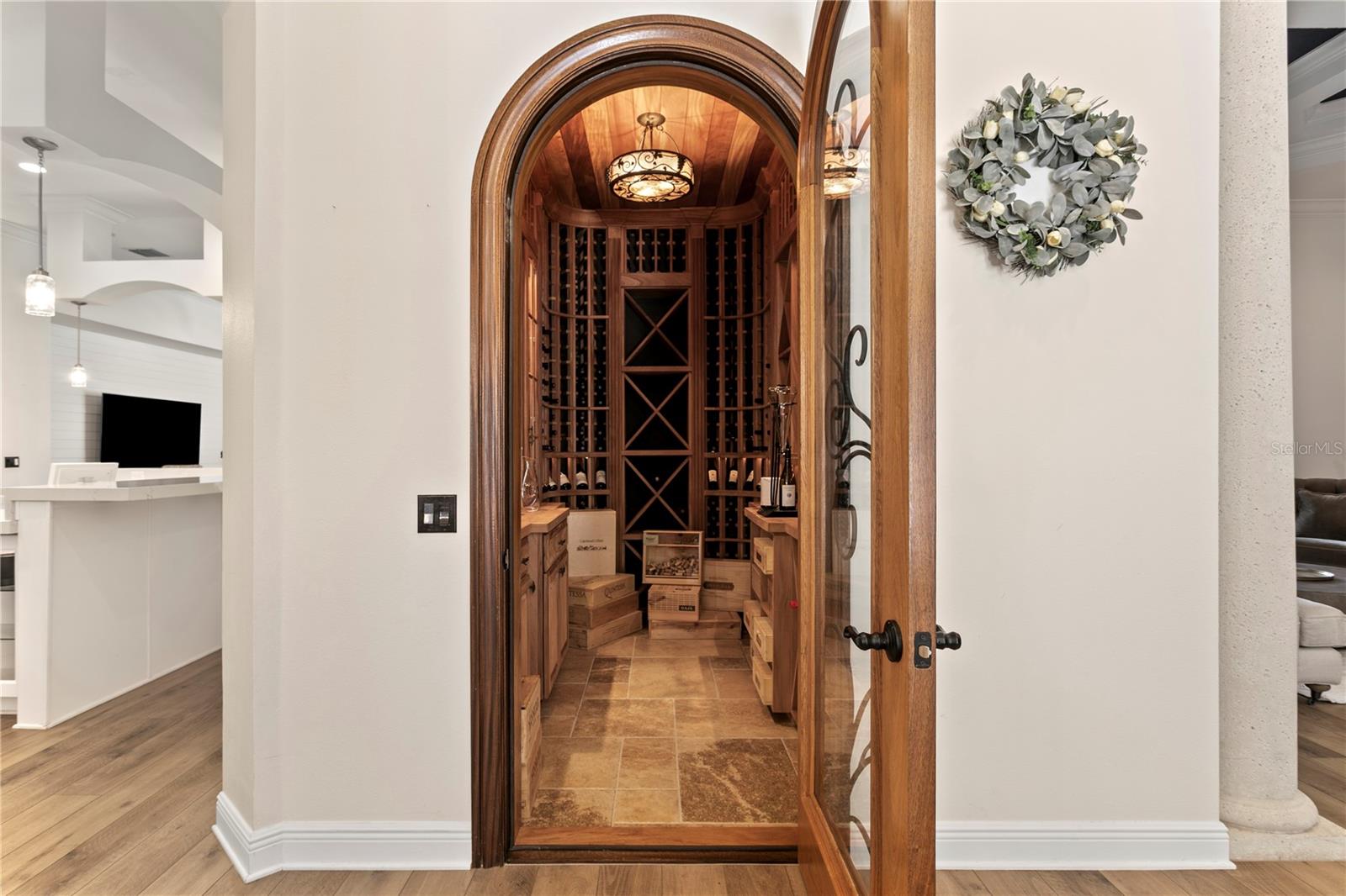Temperature-controlled wine cellar with extensive bottle storage.