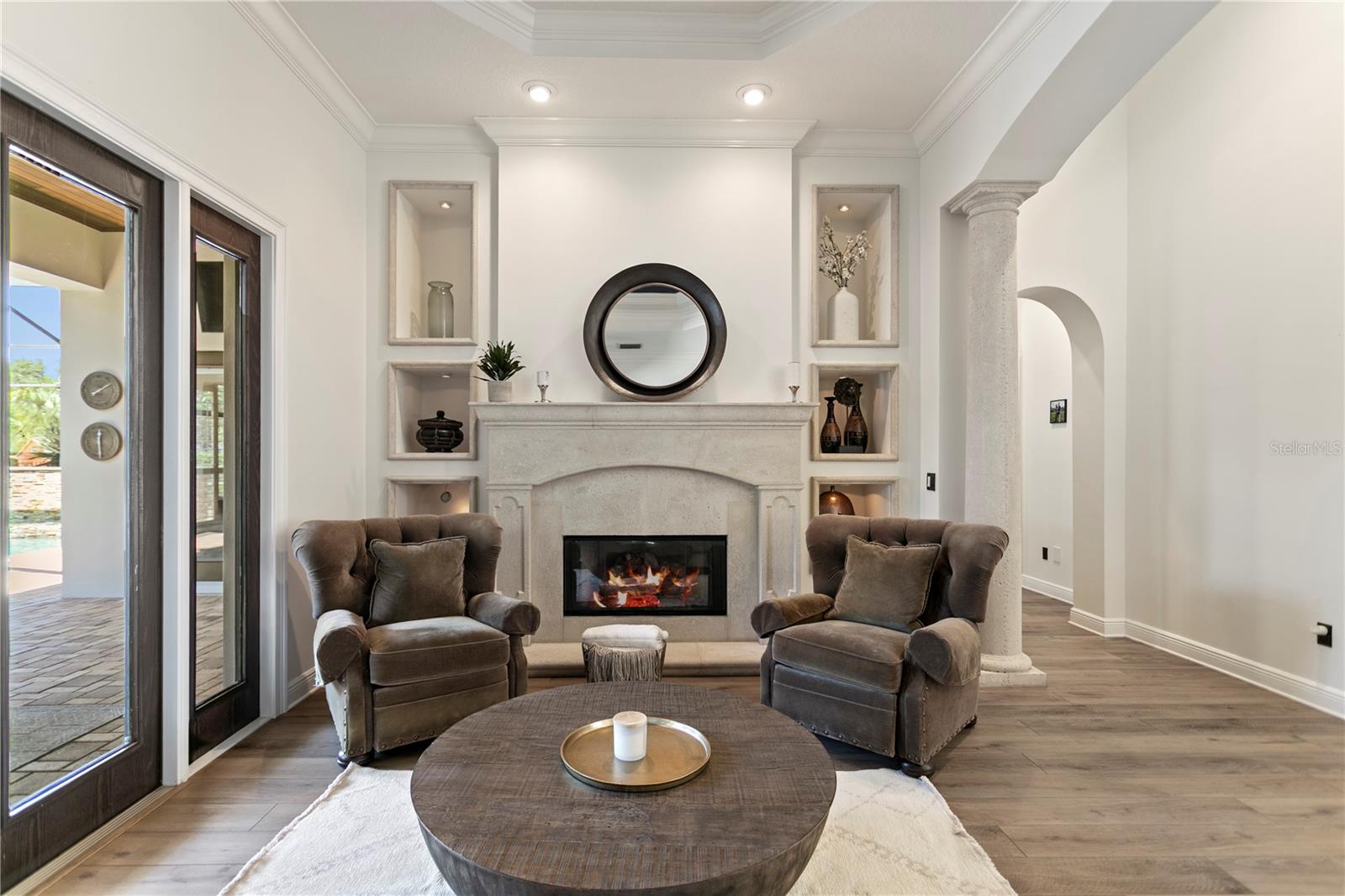 Formal Living Room with access to lanai and pool