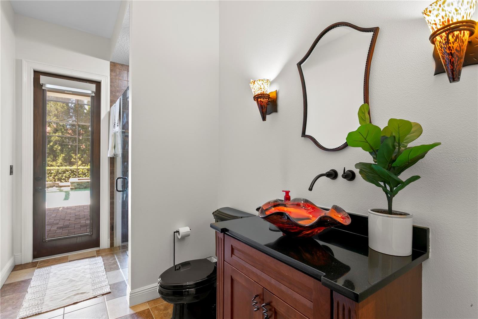 Full bathroom beside the pool