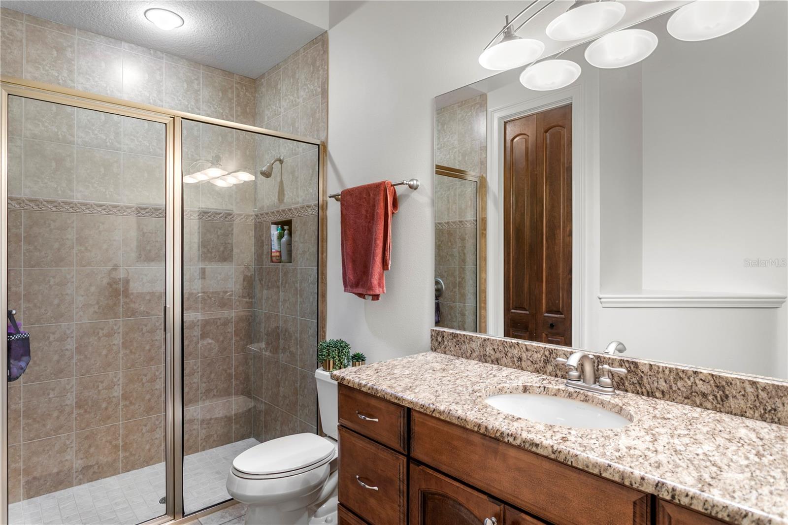 Well-appointed secondary bathroom.