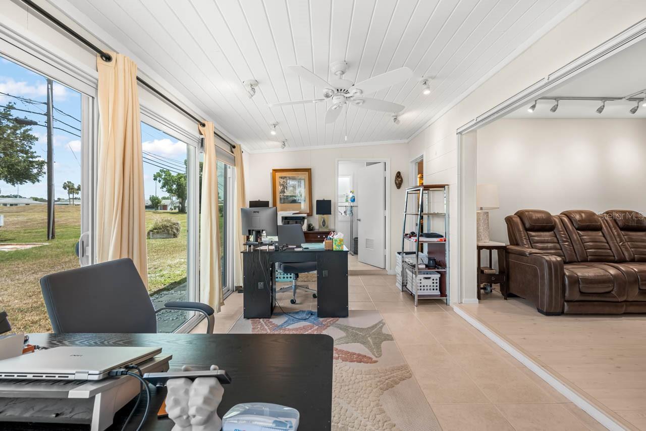 Sun room enclosed with sliding glass doors