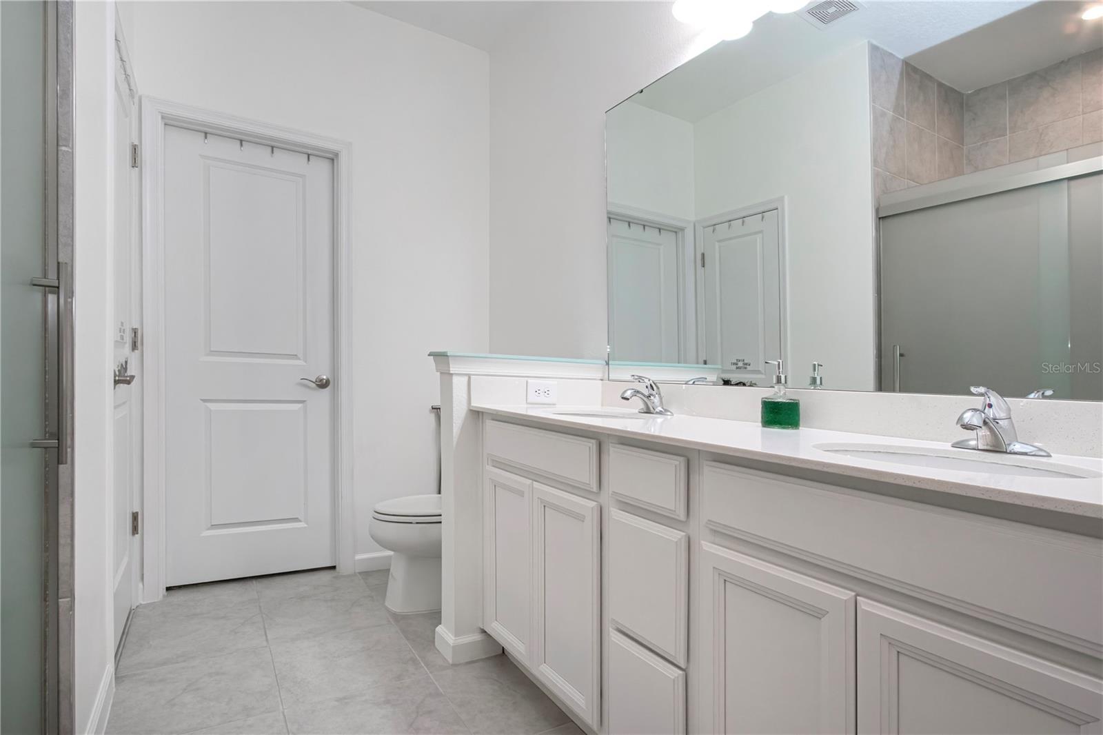 Primary Bathroom on first floor-walk-in closet
