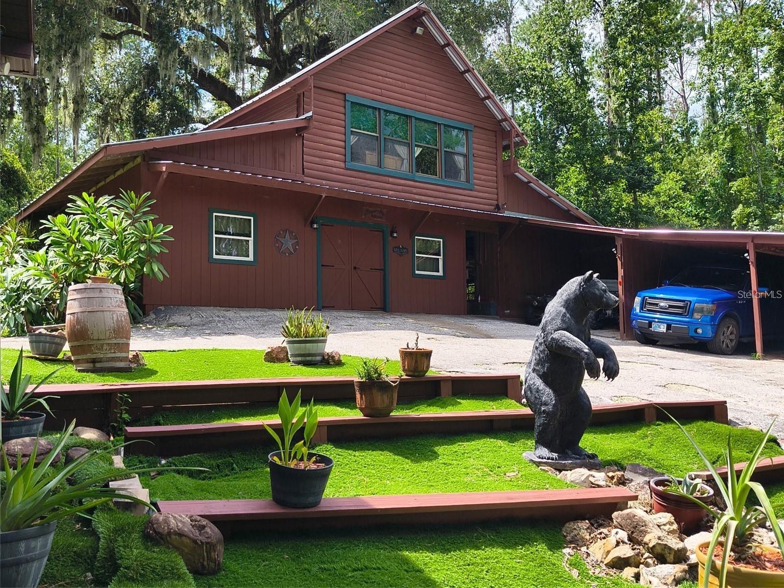 Saloon Cabin with Bear Statue to welcome your family and guests!