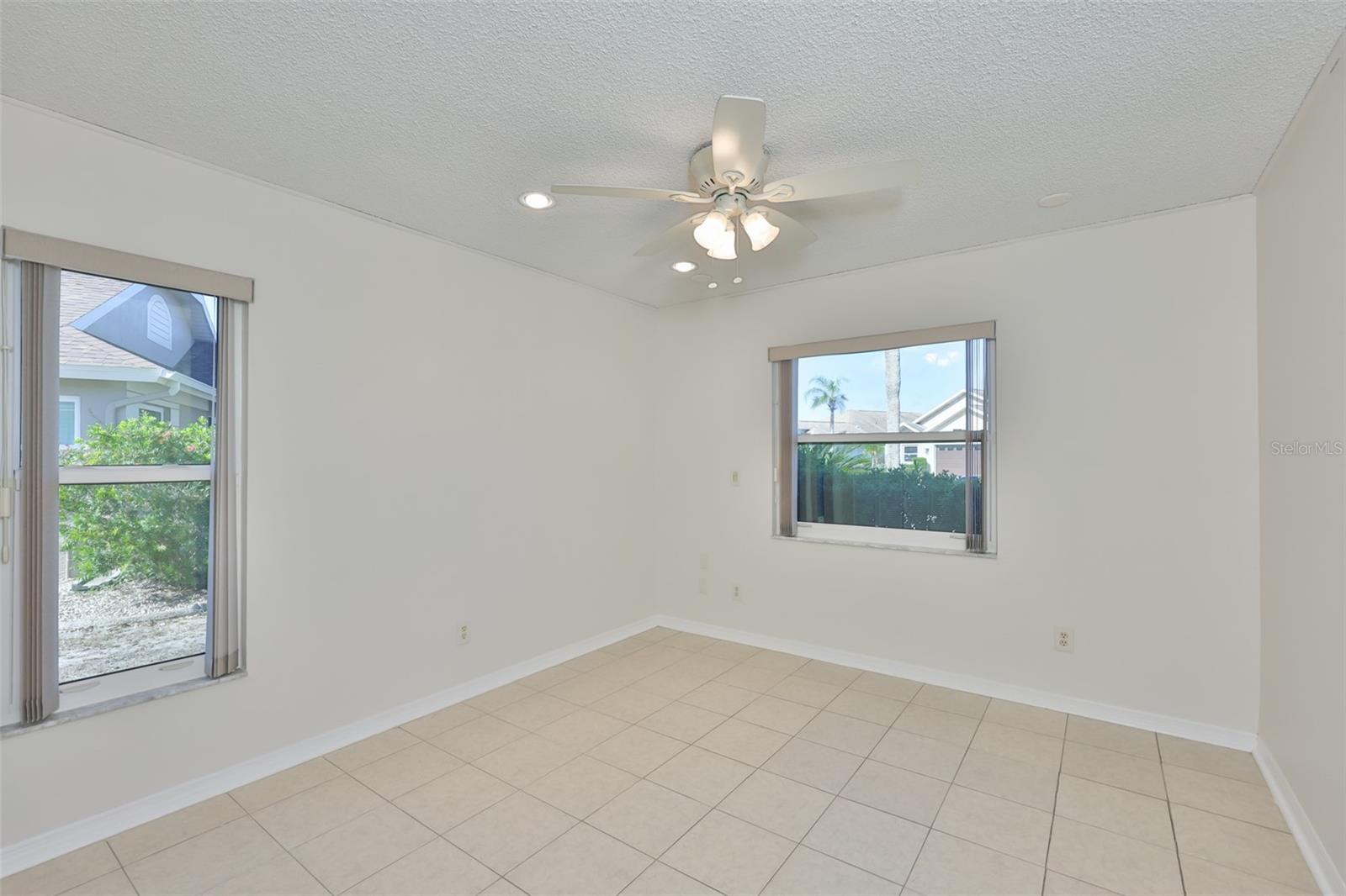 Bedroom 2, ceiling fan and window treatments