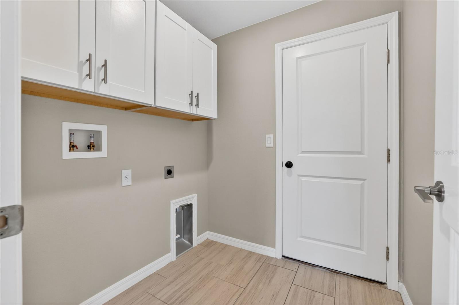 Indoor Laundry Room with Storage
