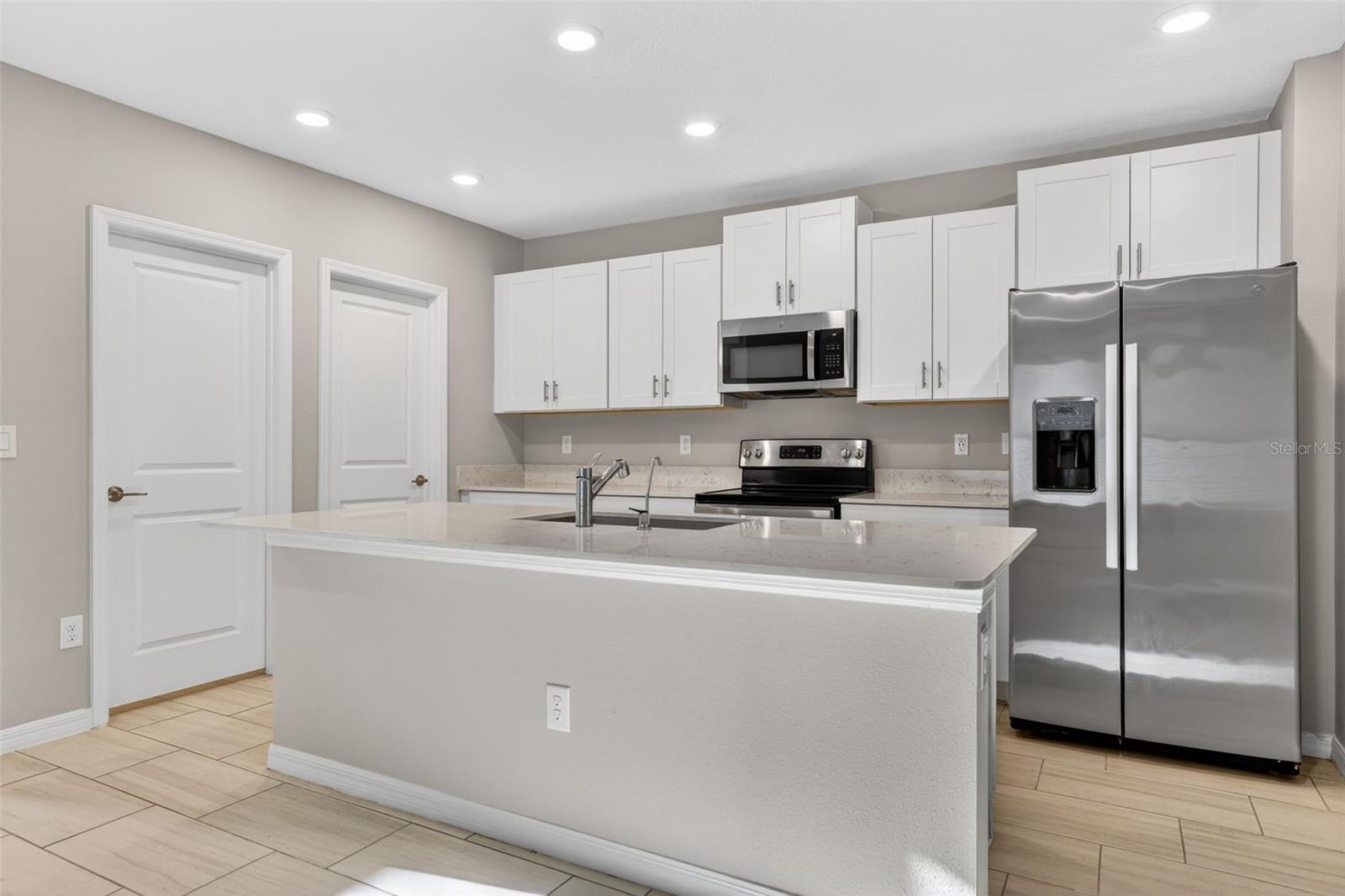 Chefs Kitchen with Stainless Steel Appliances