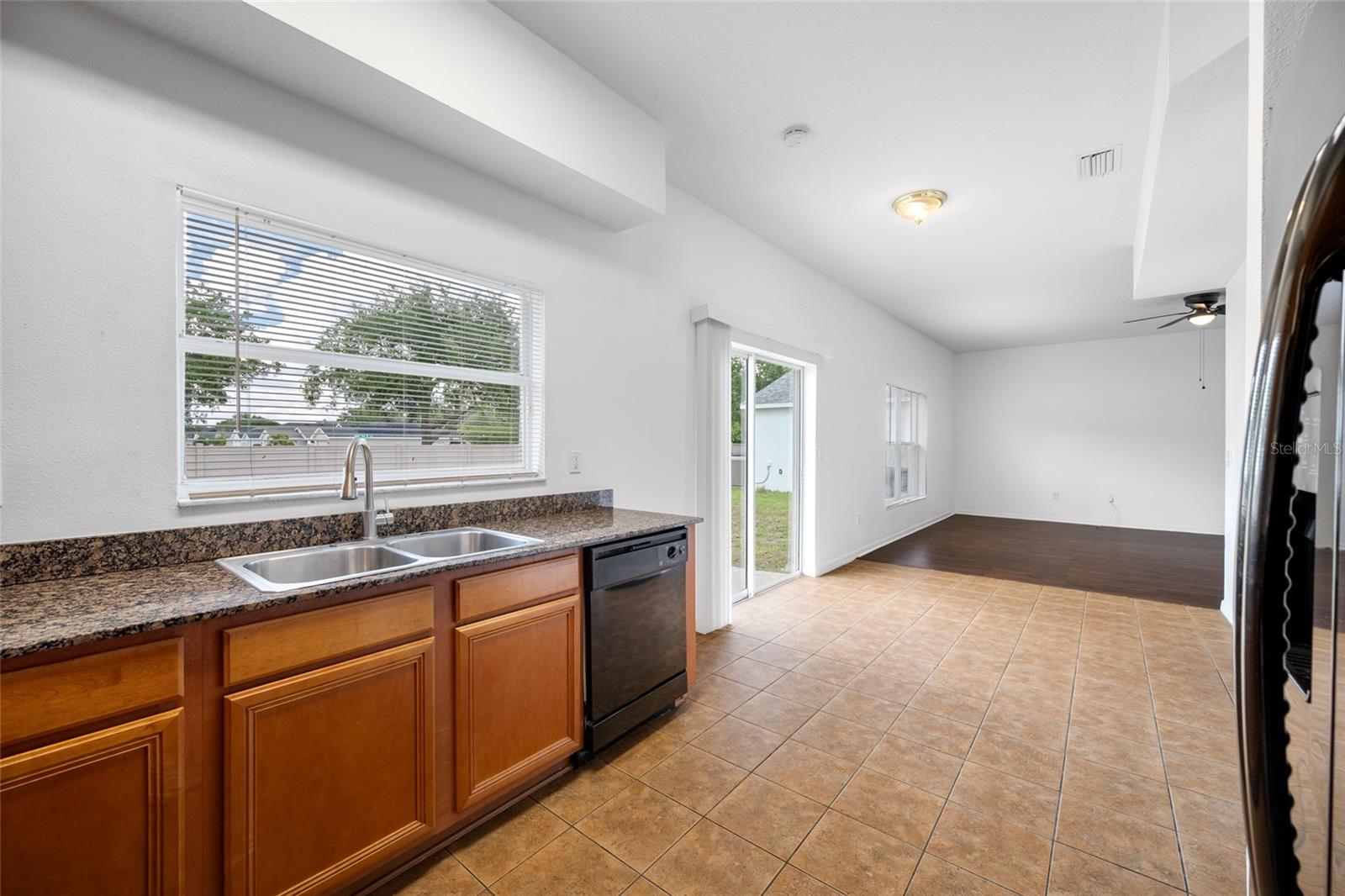Kitchen Window View, Dinette Area imto Family Room