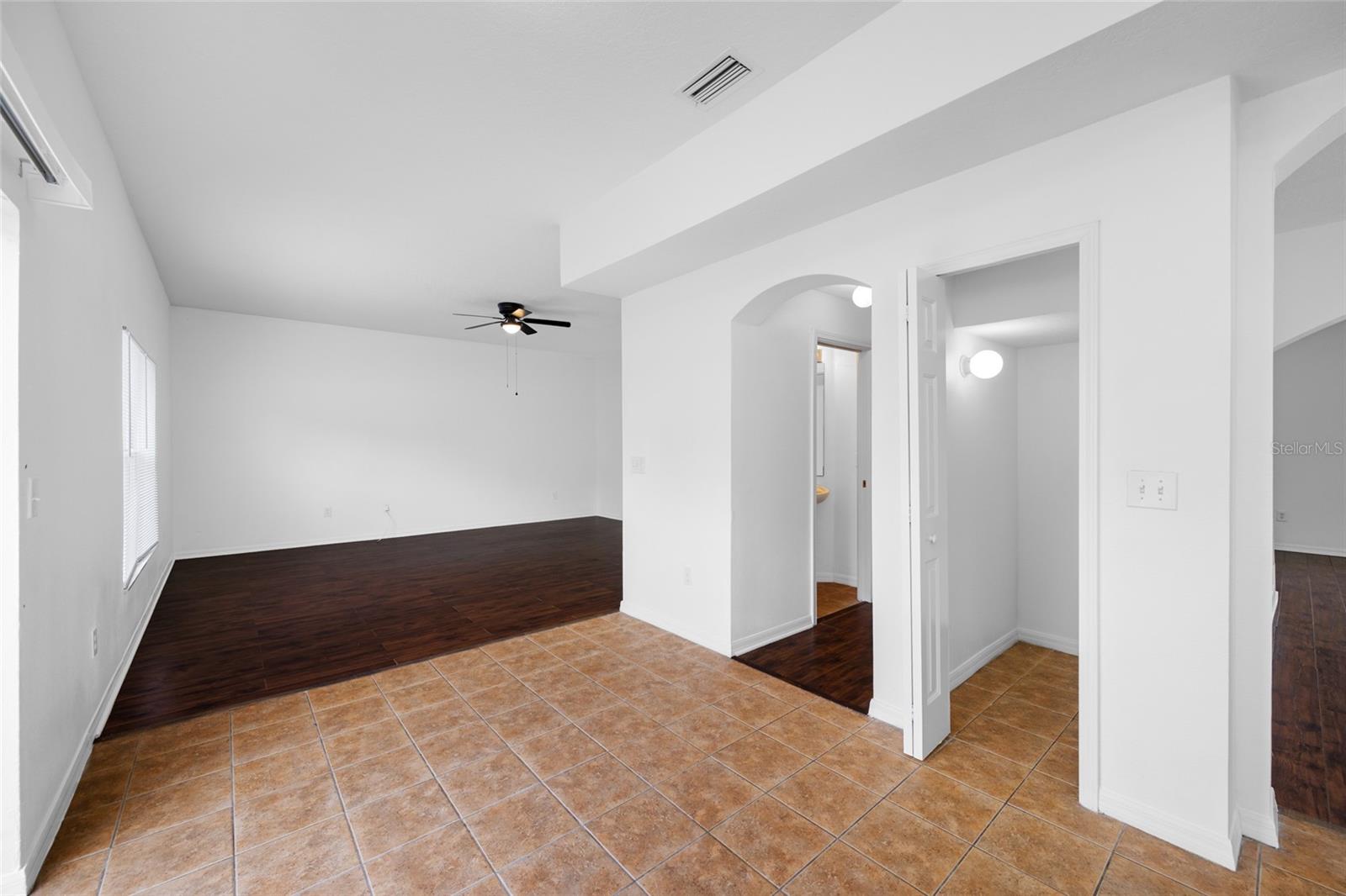 Pantry Closet and Hall Entry to Half Bath