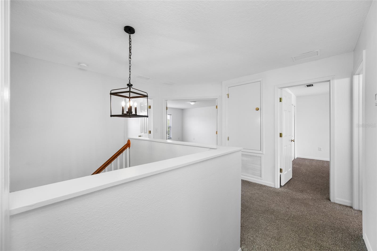 A New Chandilier at stairs for better lighting
