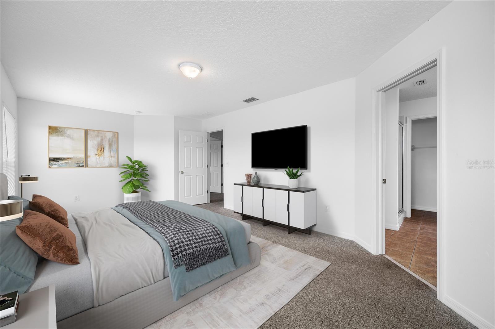 Virtually Staged Primary Bedroom with En Suite