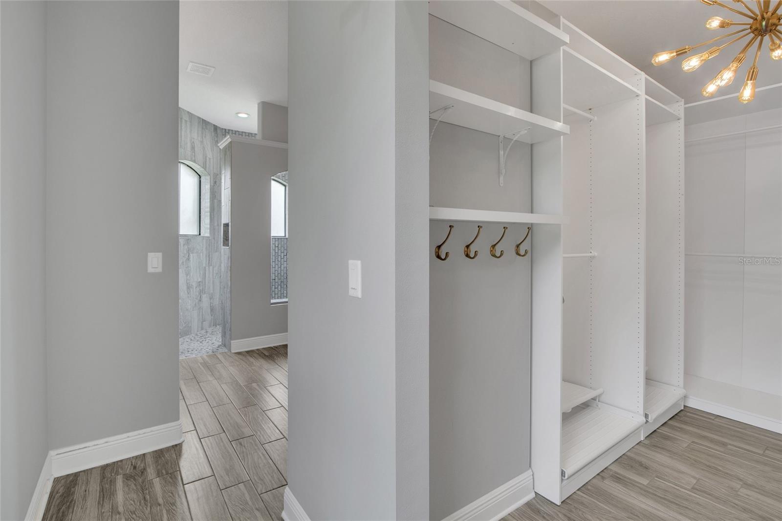 Primary closet to bathroom
