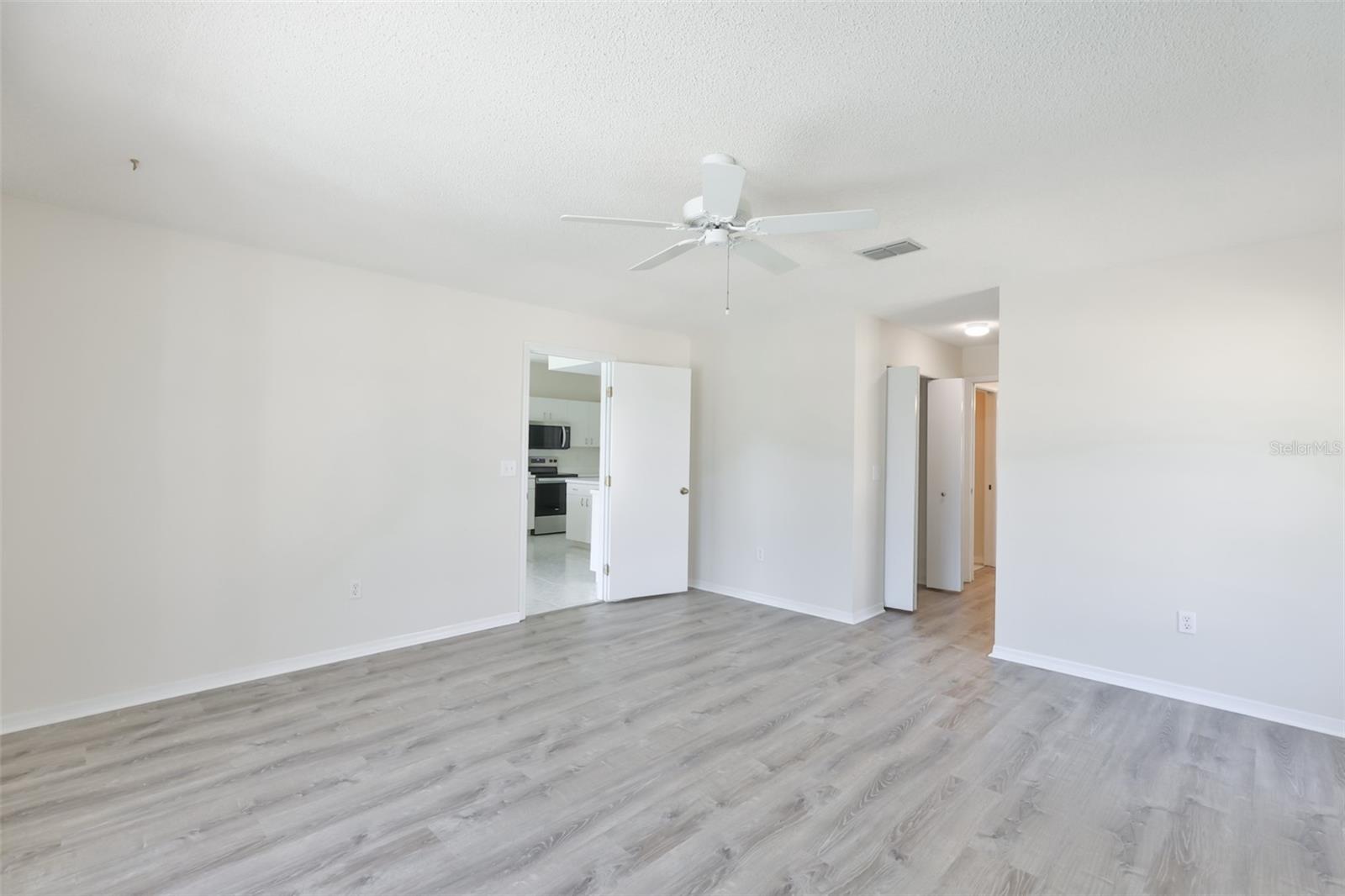 Primary bedroom, two walk-in closets and ensuite bathroom