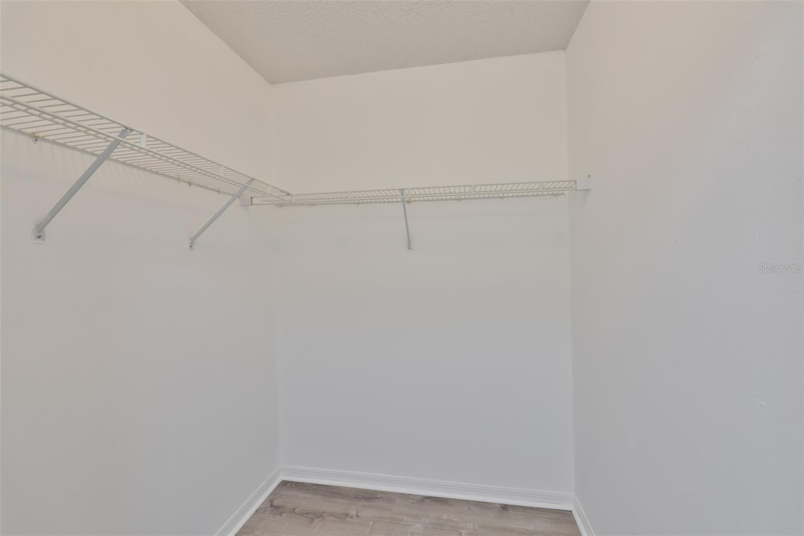 Primary bedroom, other walk-in closet