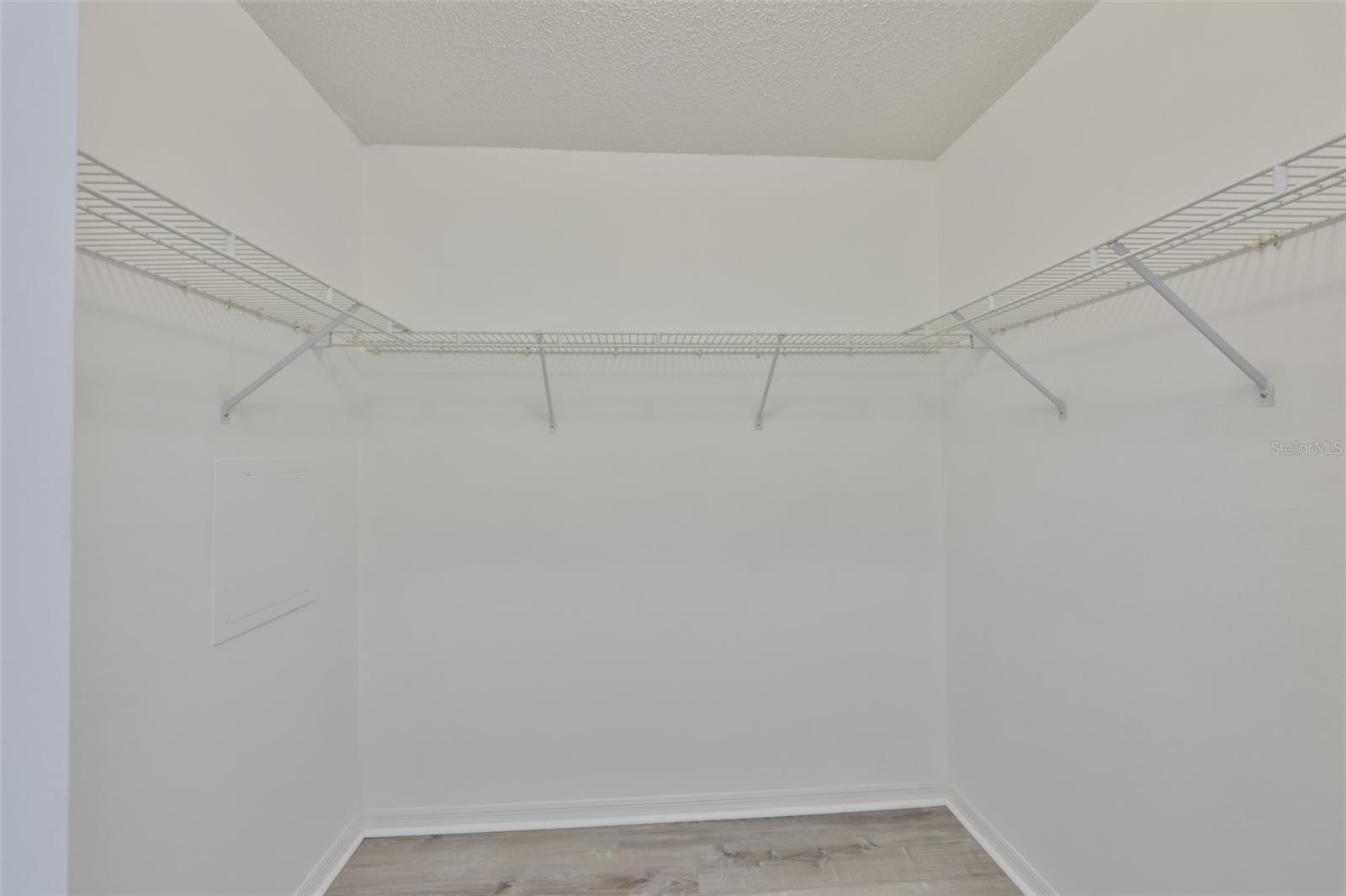 Primary bedroom, walk-in closet