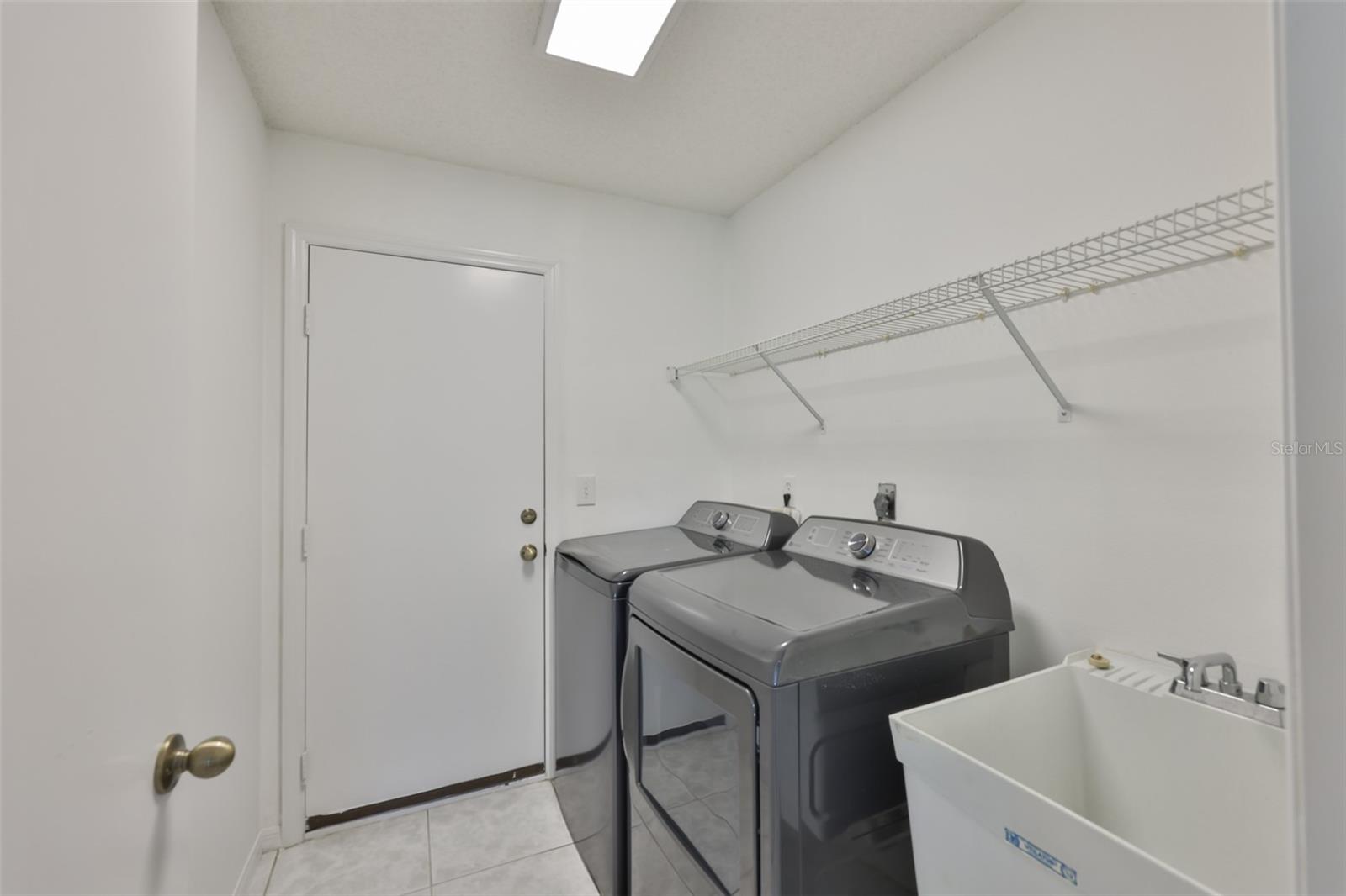 Laundry room, brand new washer and dryer - utility sink comes in handy!