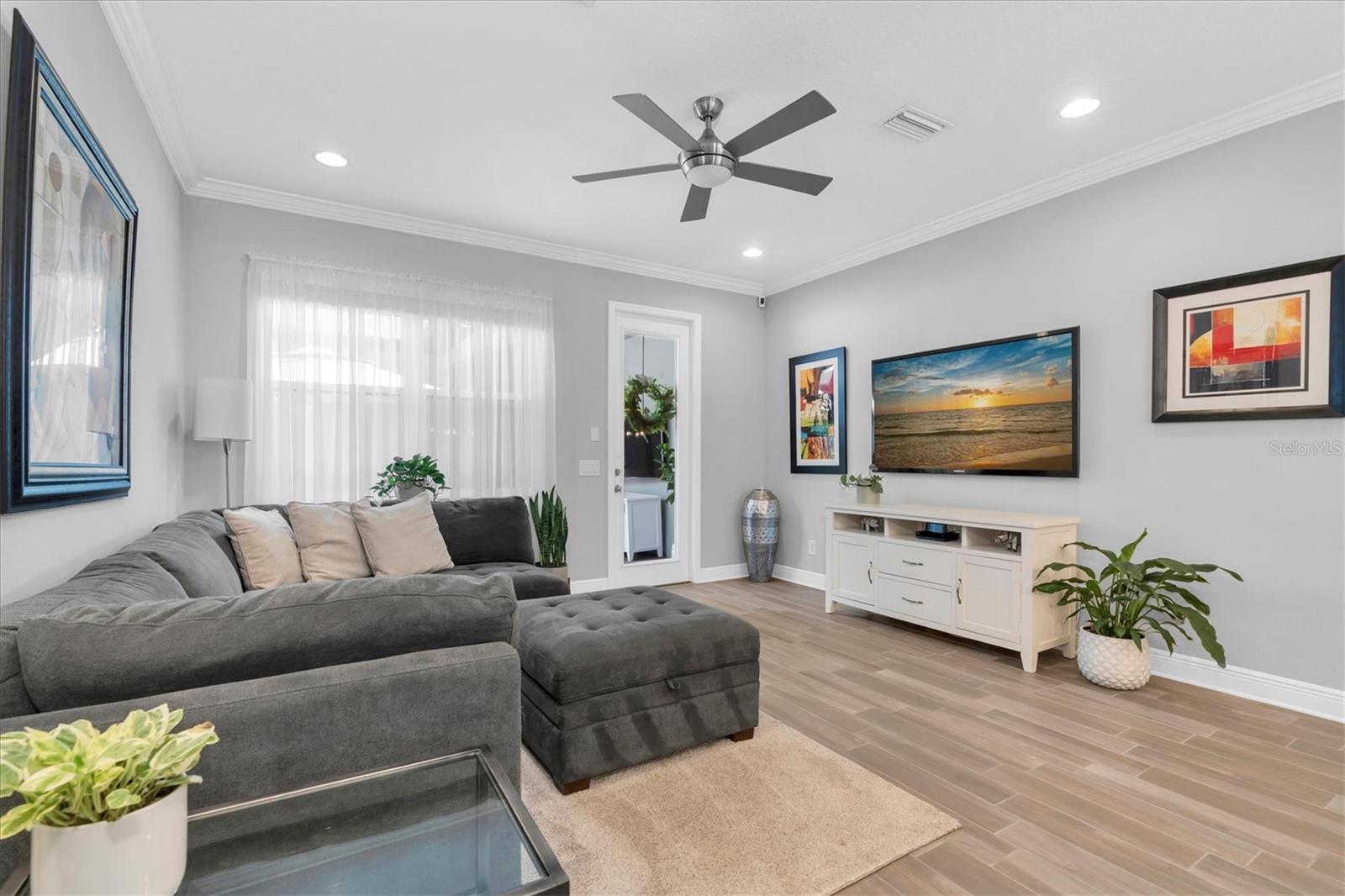 LIVING ROOM IS LIGHT & BRIGHT